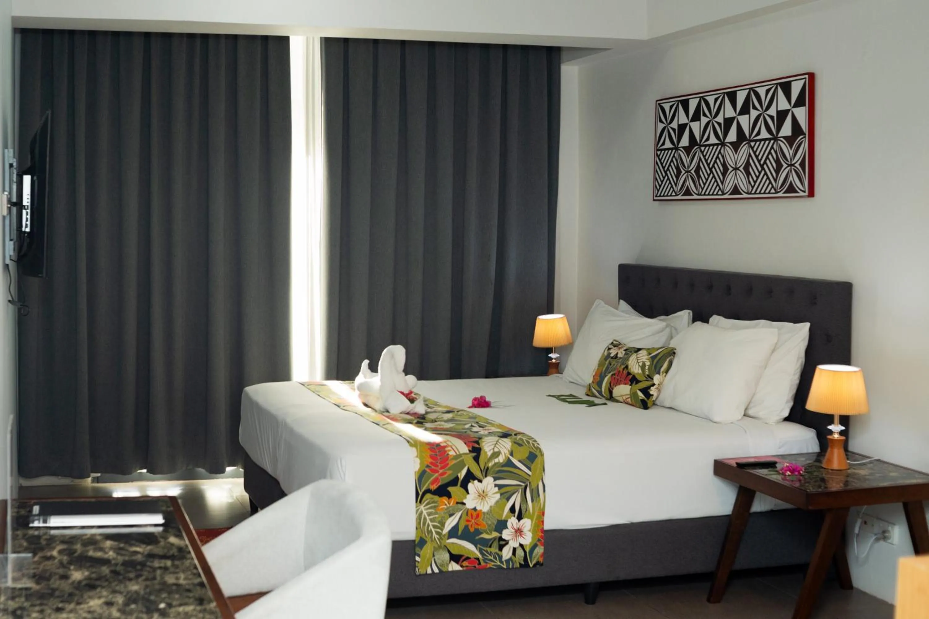 Bed in Ramada Suites By Wyndham Seafront Coral Coast