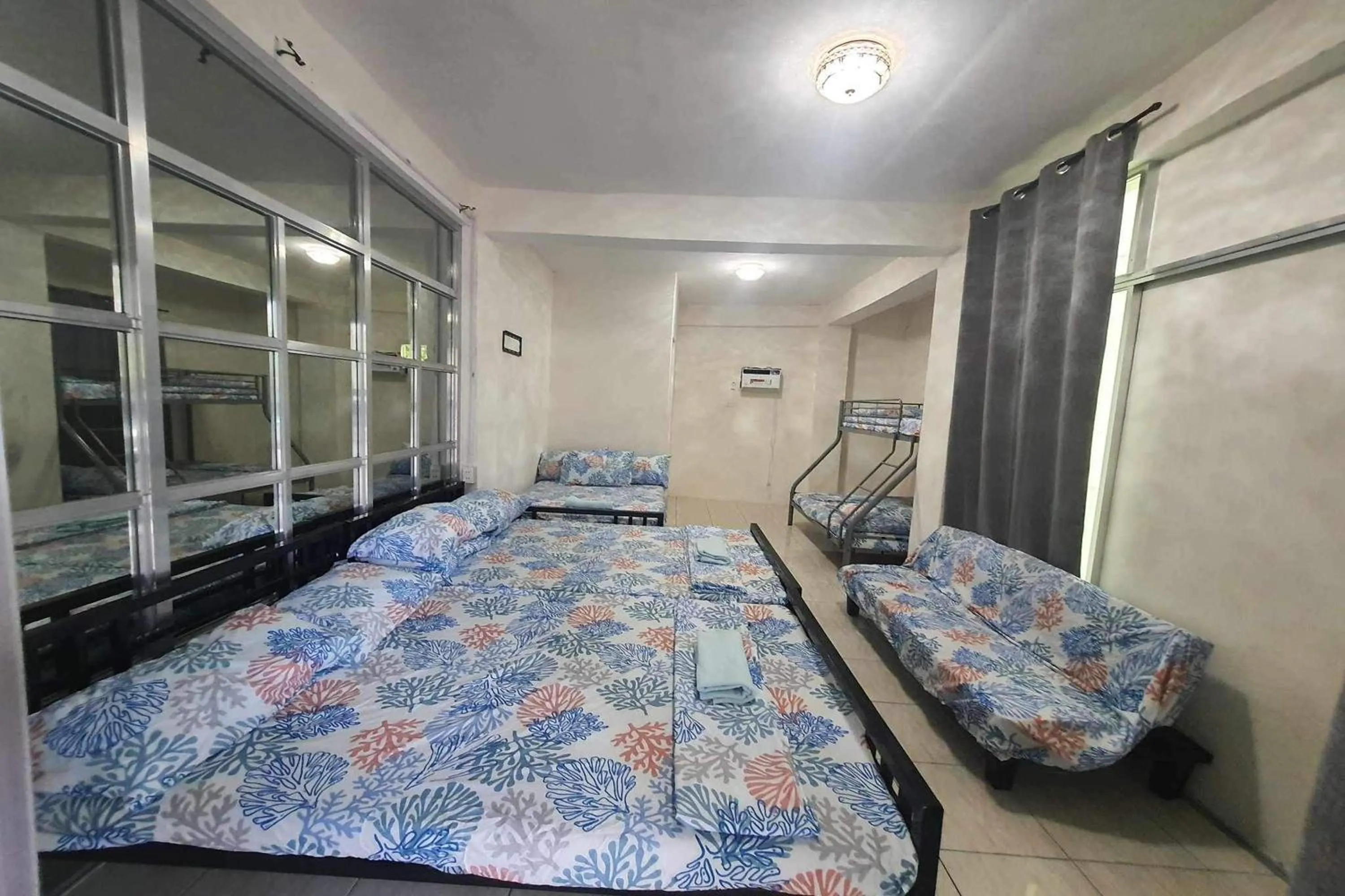 Bed in Bohol Transient Lruy near Panglao Beach