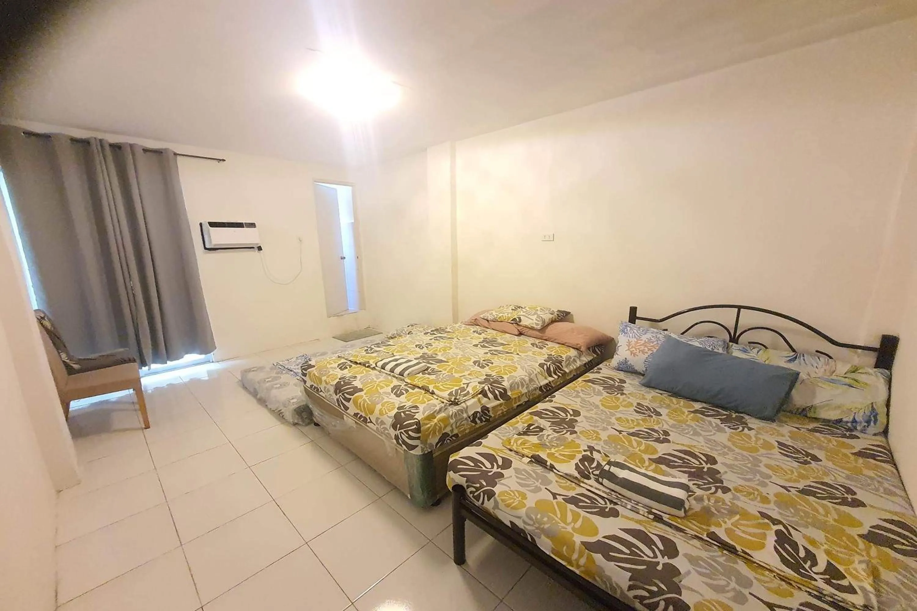 Bed in Bohol Transient Lruy near Panglao Beach