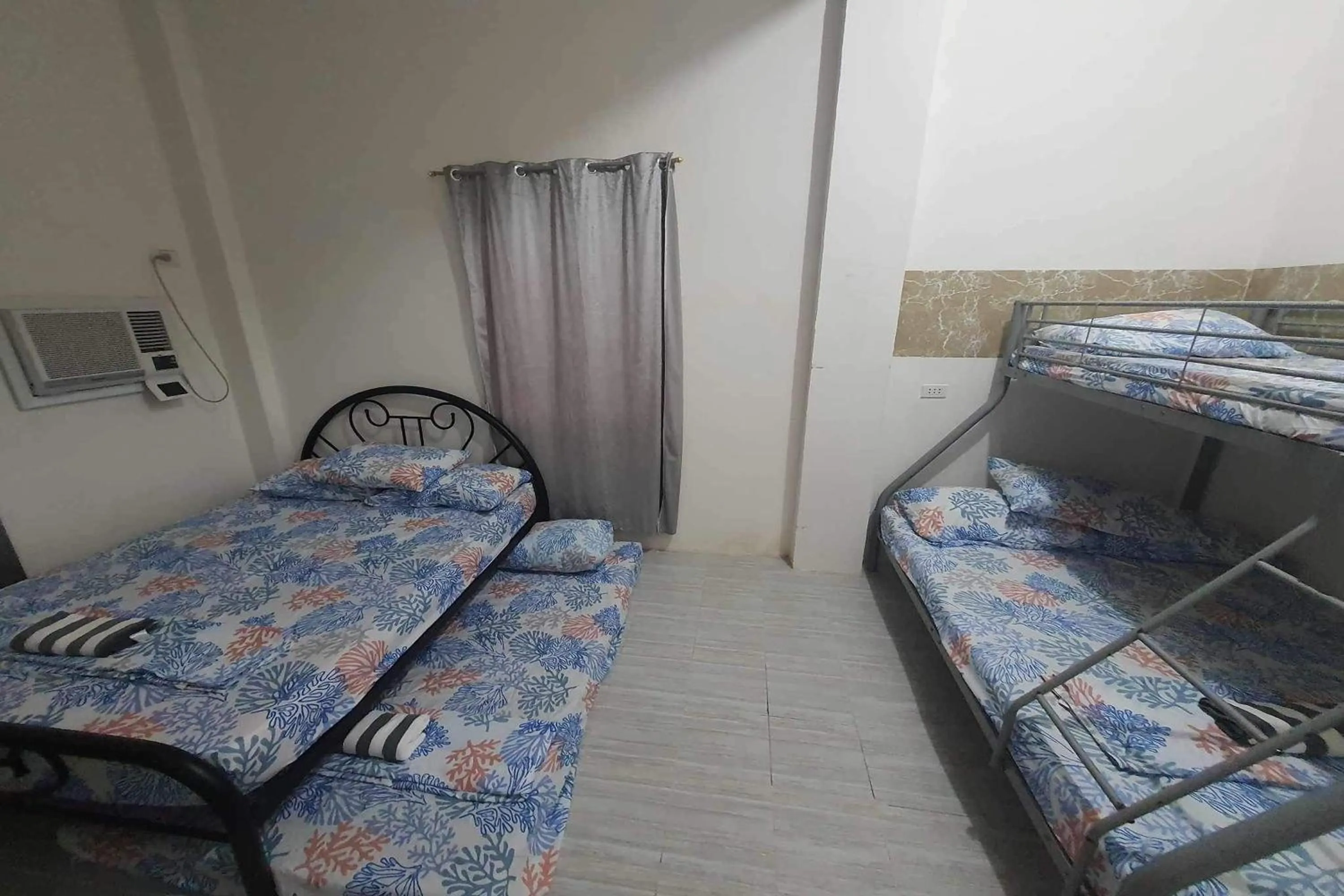 Bed in Bohol Transient Lruy near Panglao Beach