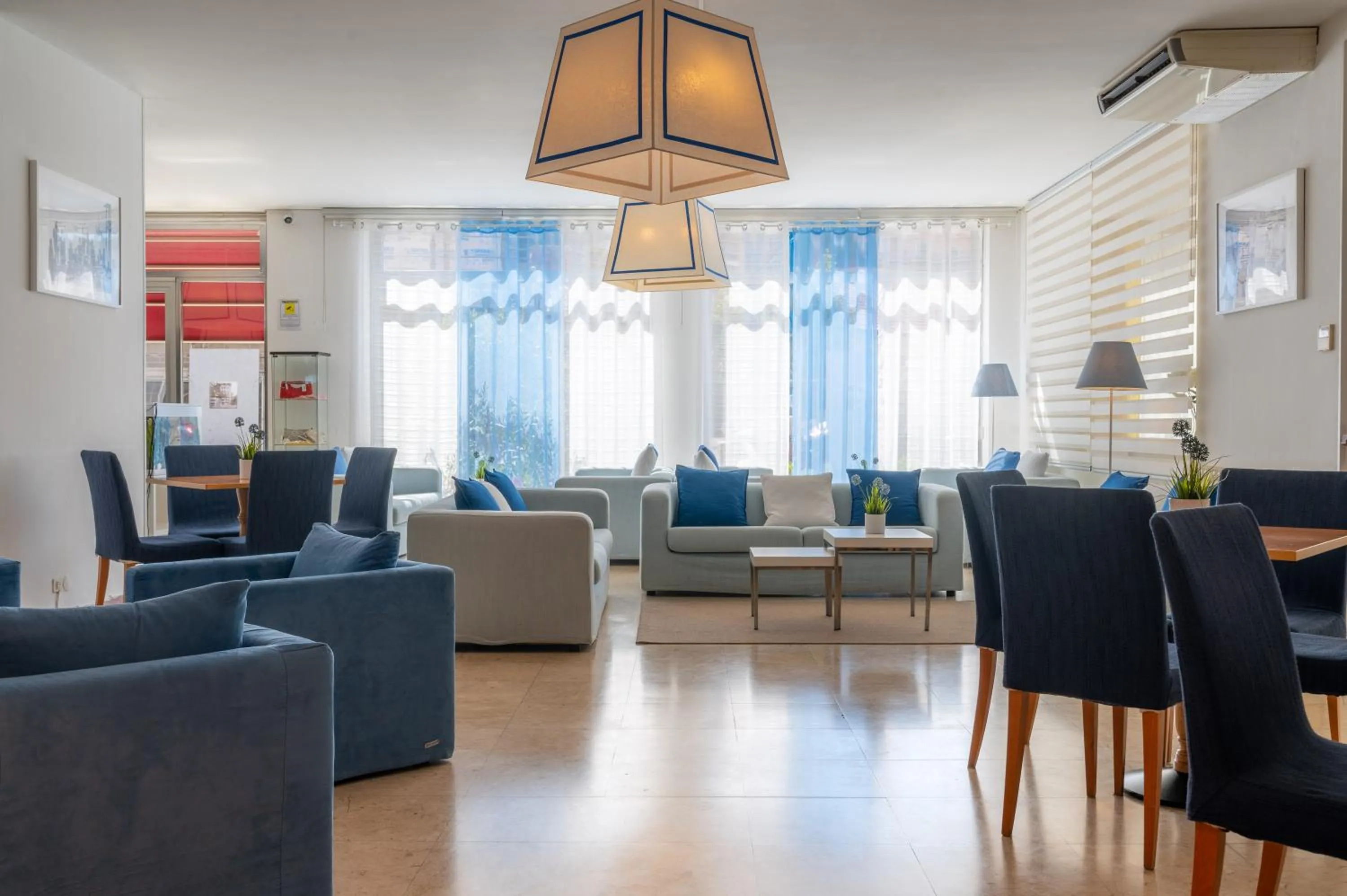 Communal lounge/ TV room in Hotel Doria