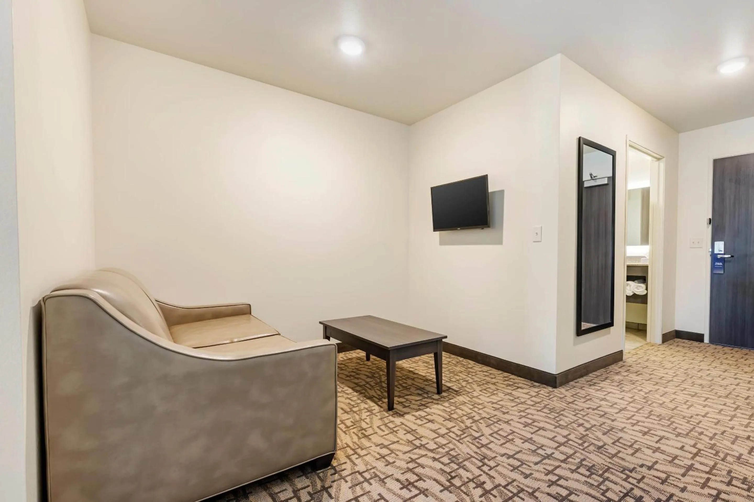 Bedroom in Comfort Inn & Suites Medina NY near Erie Canal