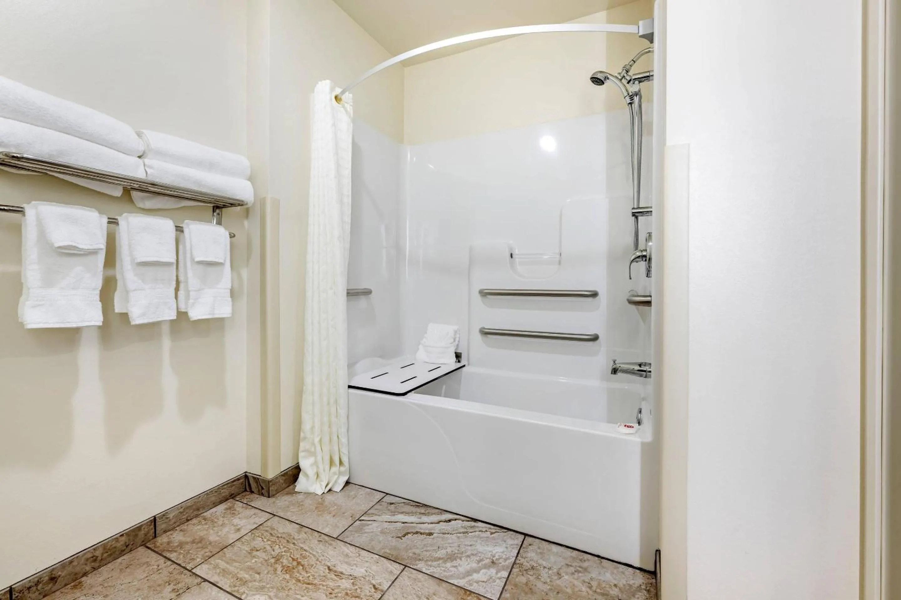 Bedroom in Comfort Inn & Suites Medina NY near Erie Canal