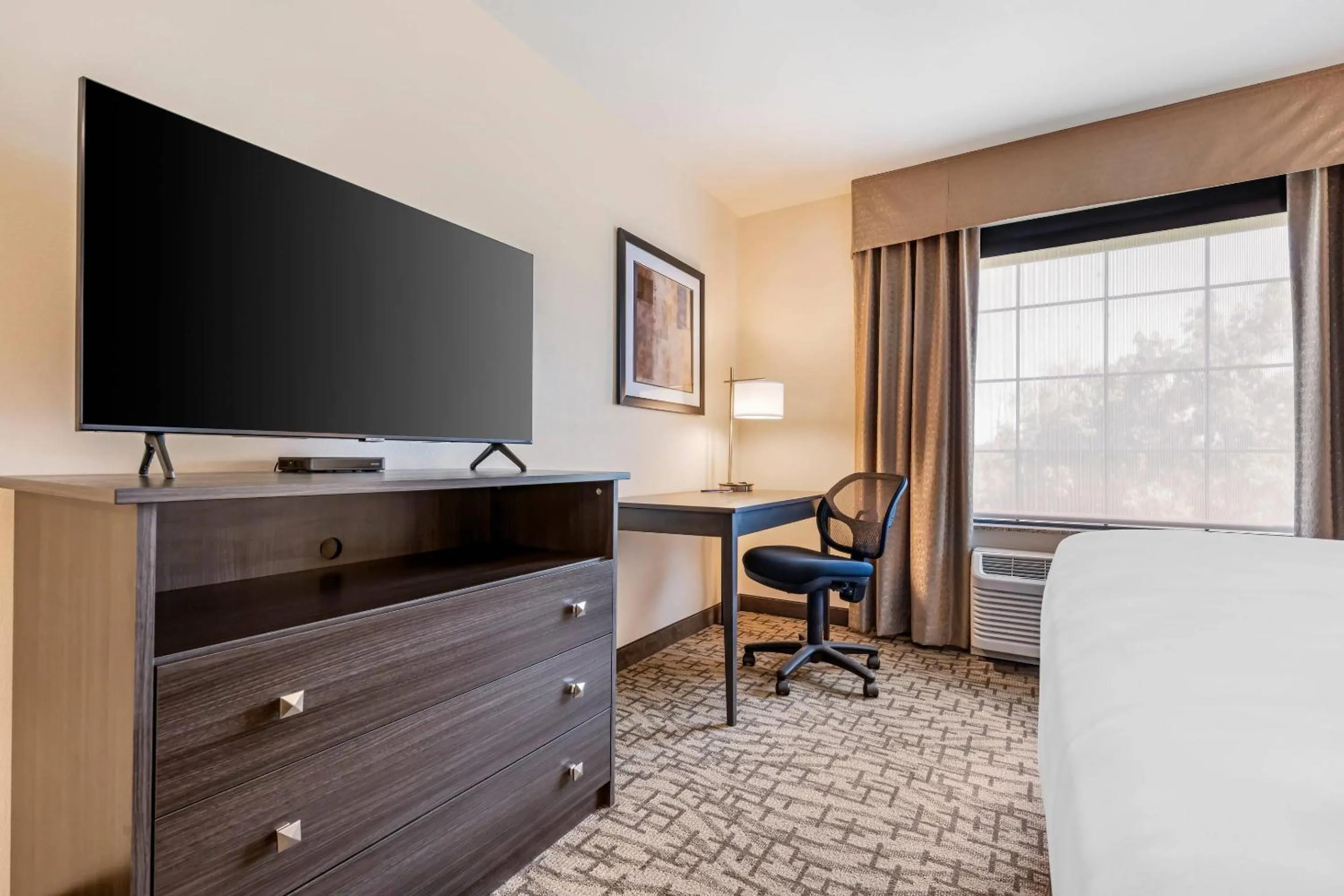 Bedroom in Comfort Inn & Suites Medina NY near Erie Canal