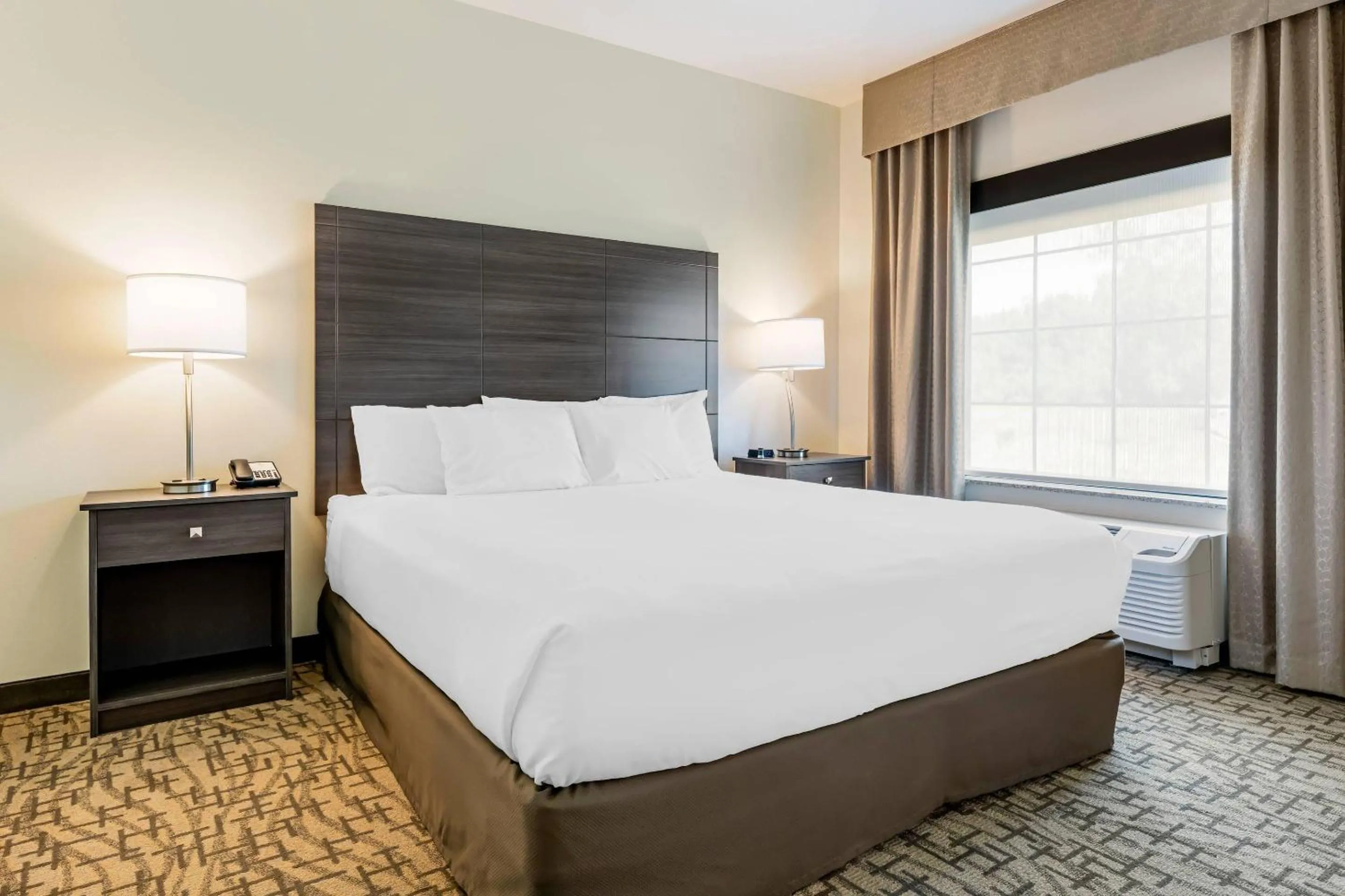 Bedroom, Bed in Comfort Inn & Suites Medina NY near Erie Canal