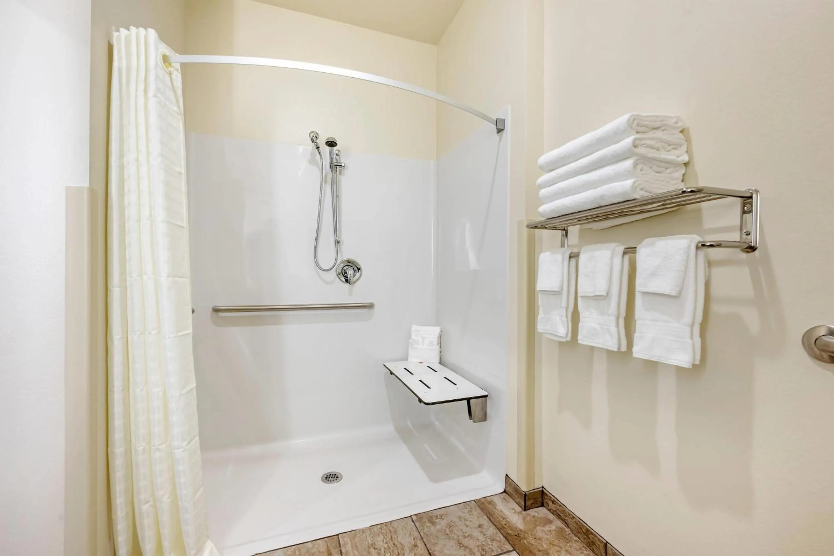 Bedroom in Comfort Inn & Suites Medina NY near Erie Canal