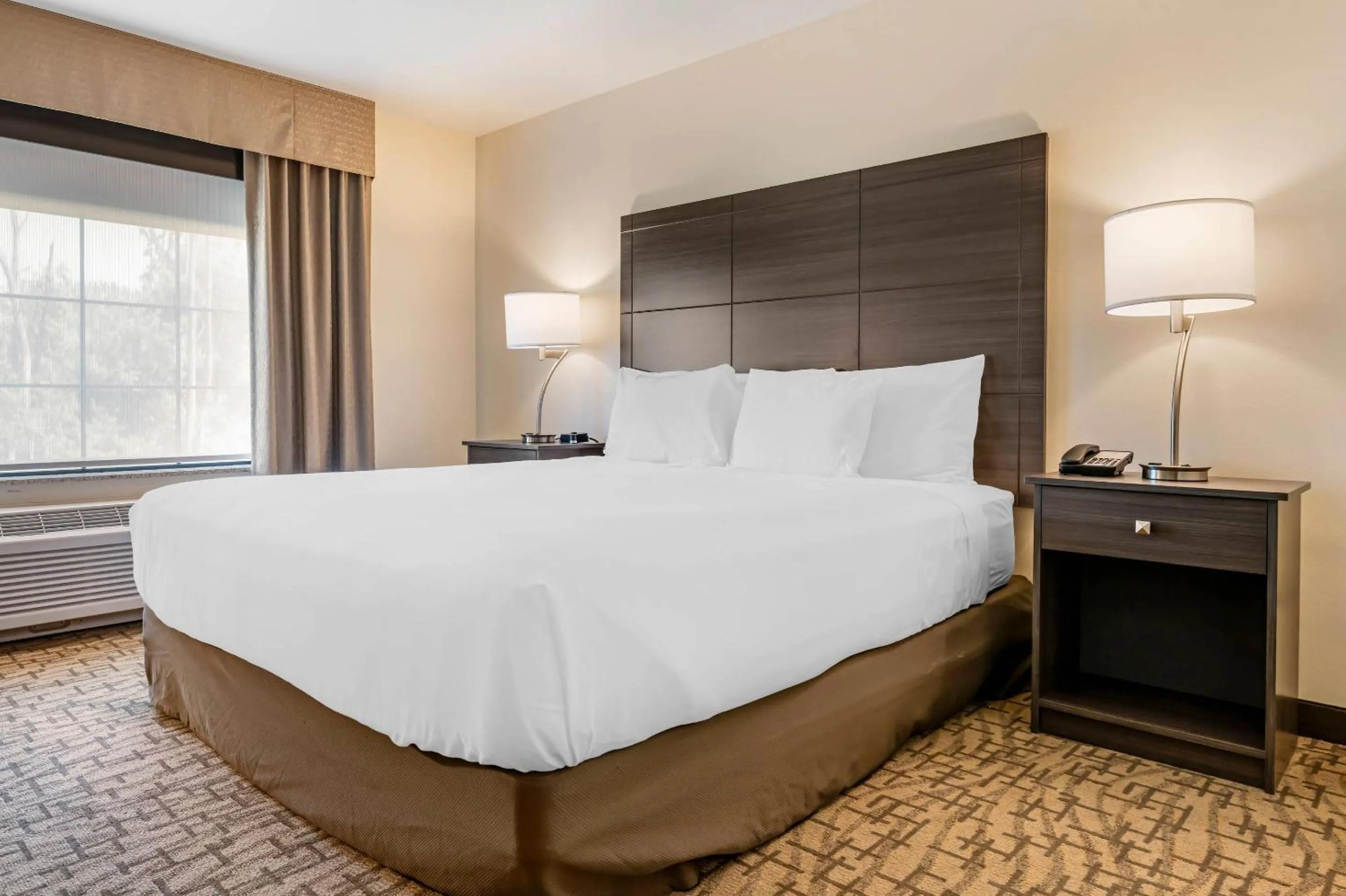 Bedroom, Bed in Comfort Inn & Suites Medina NY near Erie Canal