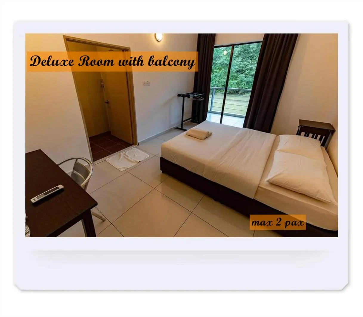 Bed in RIVERSIDE PALM INN SG LEMBING