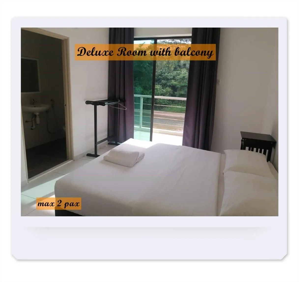 Bed in RIVERSIDE PALM INN SG LEMBING