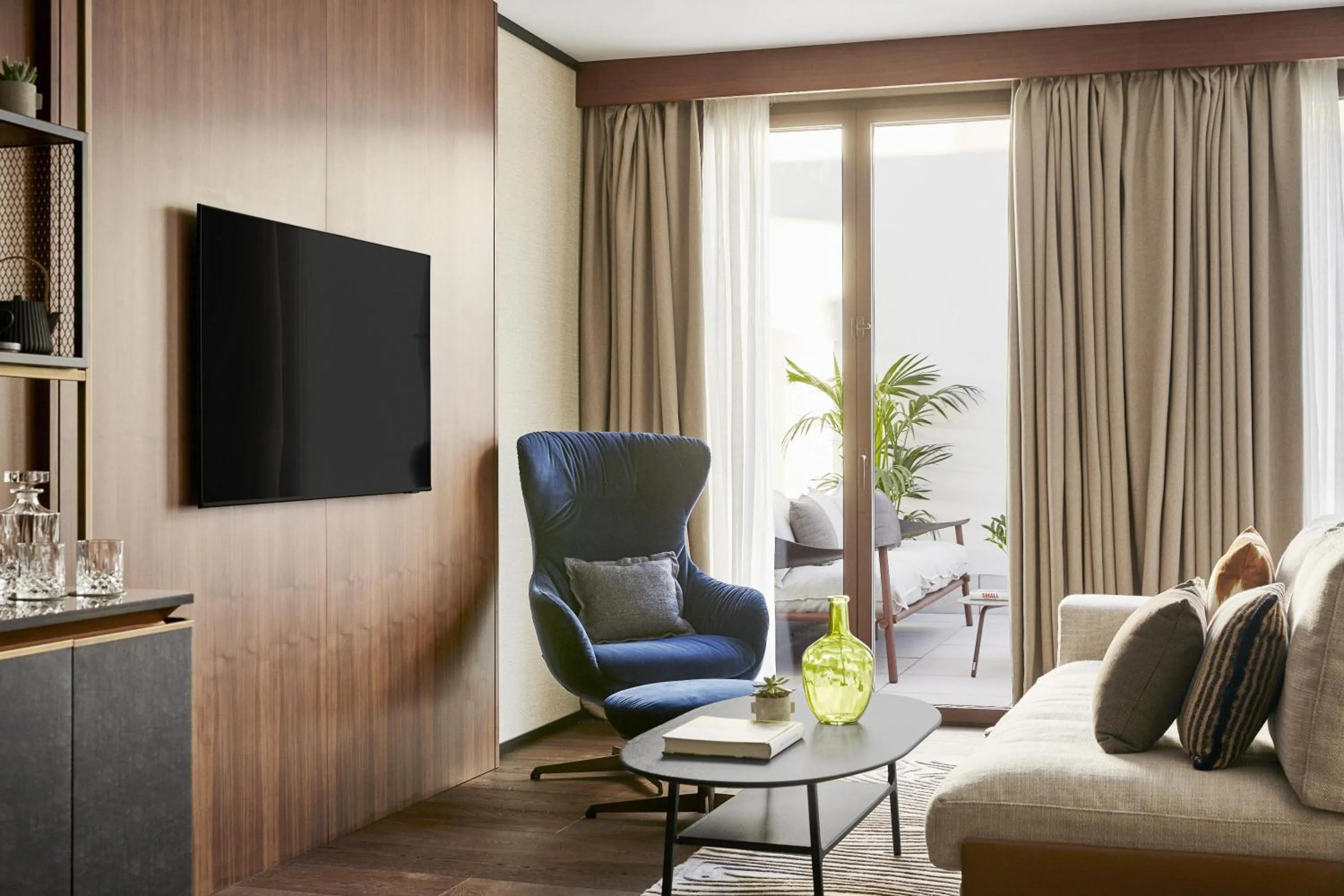 Communal lounge/ TV room in Thompson Madrid, by Hyatt