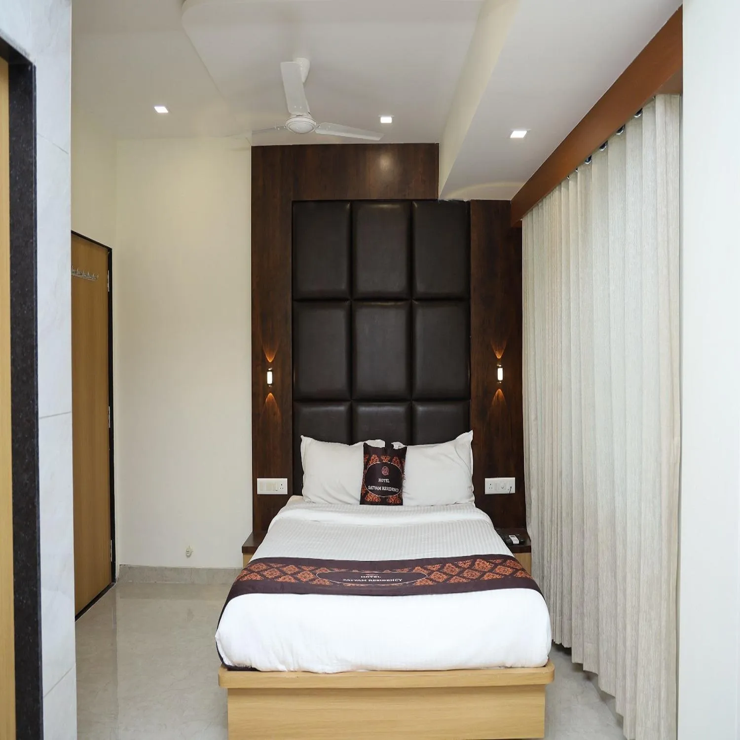Bed in Hotel Satyam Residency