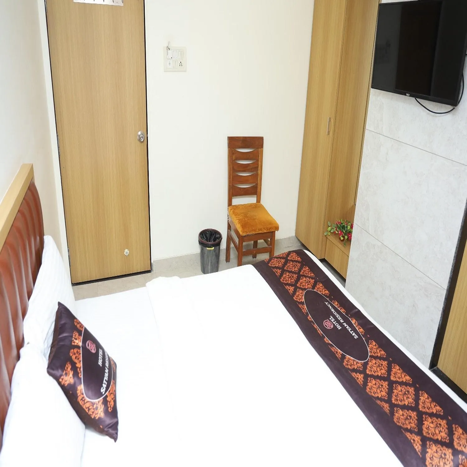 Bed in Hotel Satyam Residency