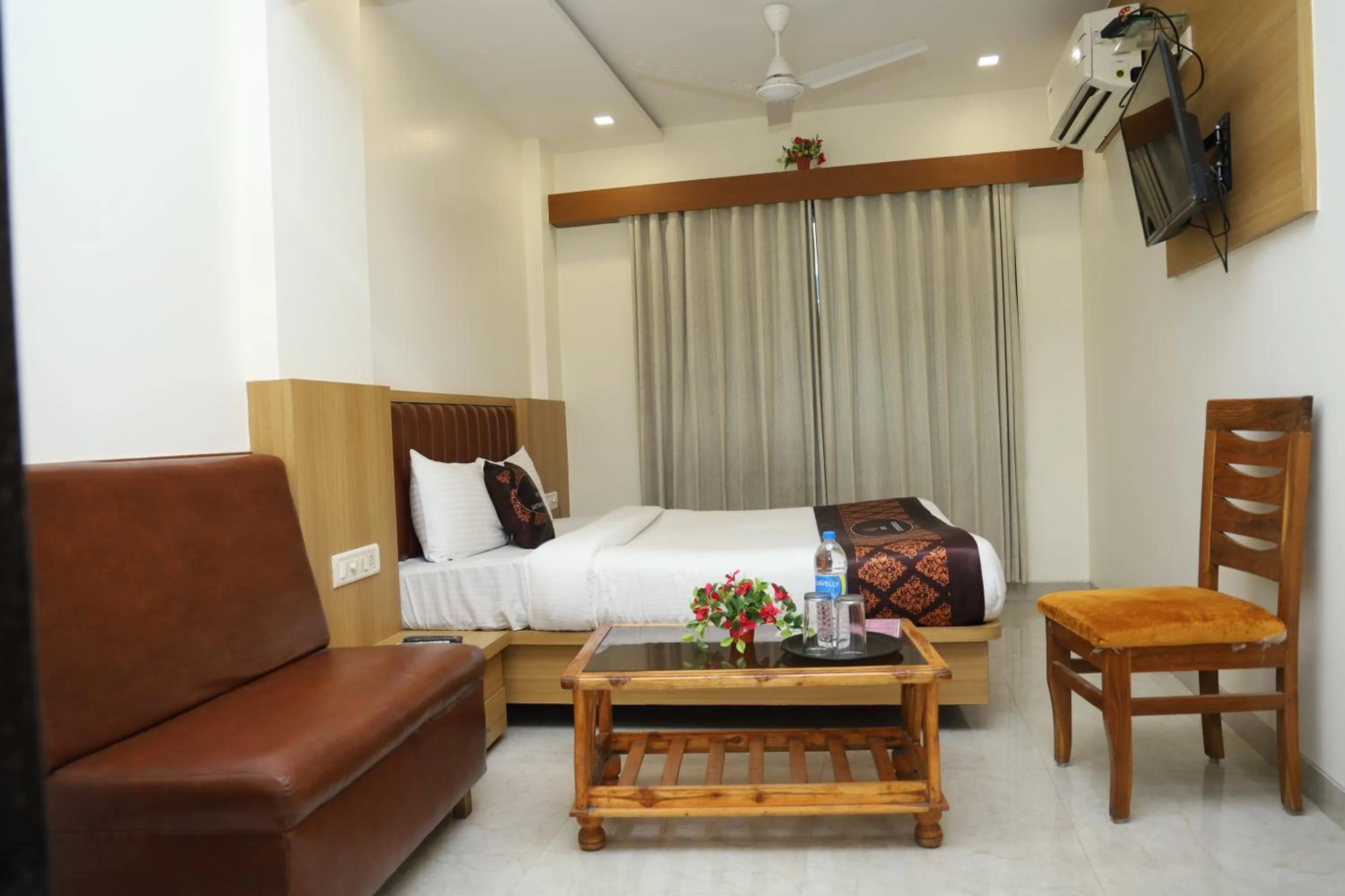 TV and multimedia, Bed in Hotel Satyam Residency