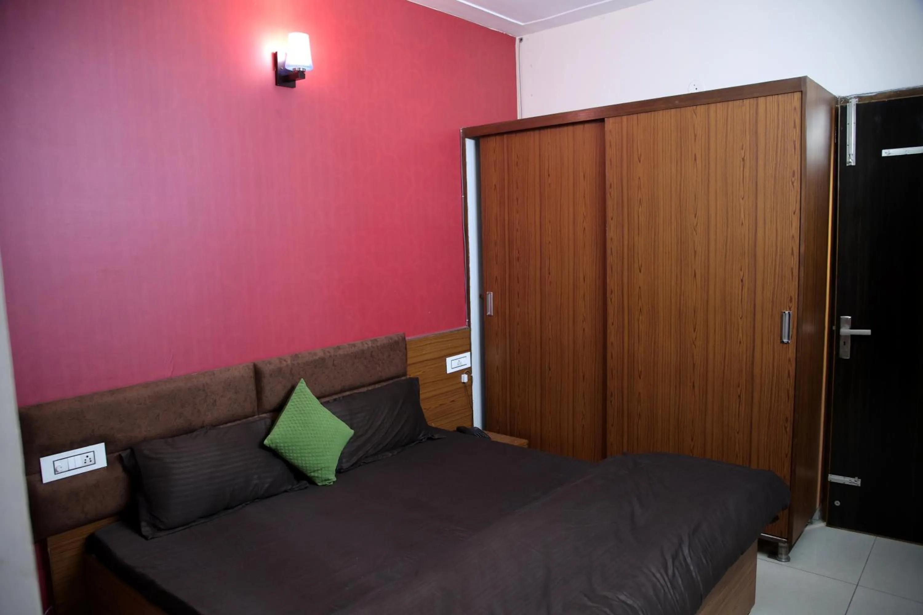 Bedroom in Hotel O Galaxy Stays