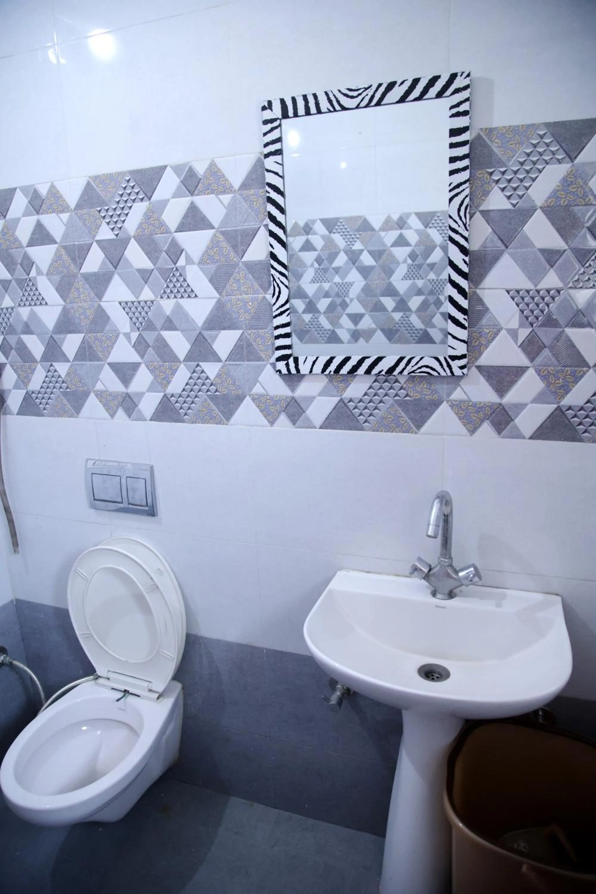 Bathroom in Hotel O Galaxy Stays