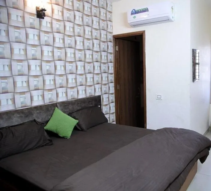 Bedroom in Hotel O Galaxy Stays