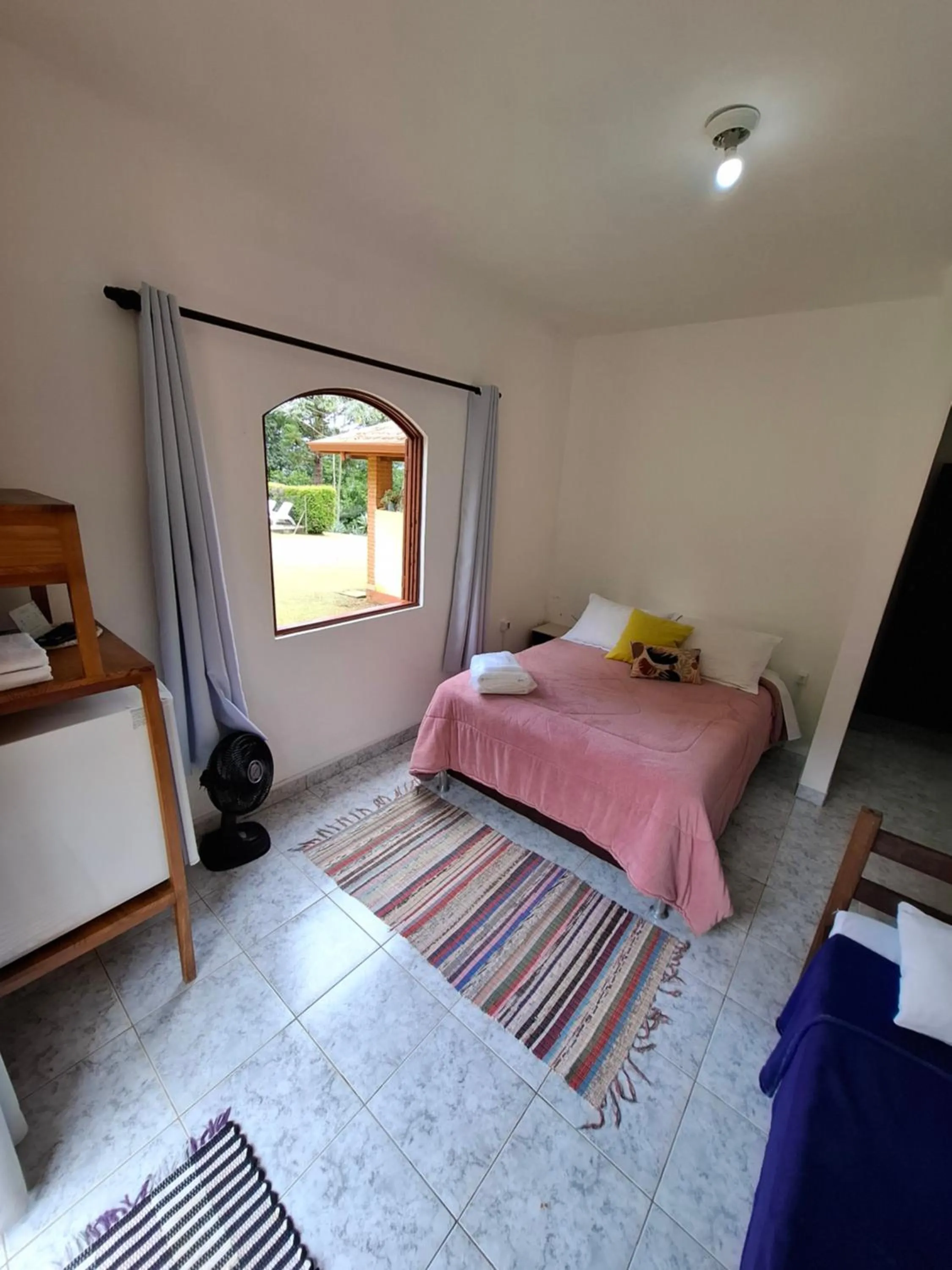 Bed in Pousada Vitória