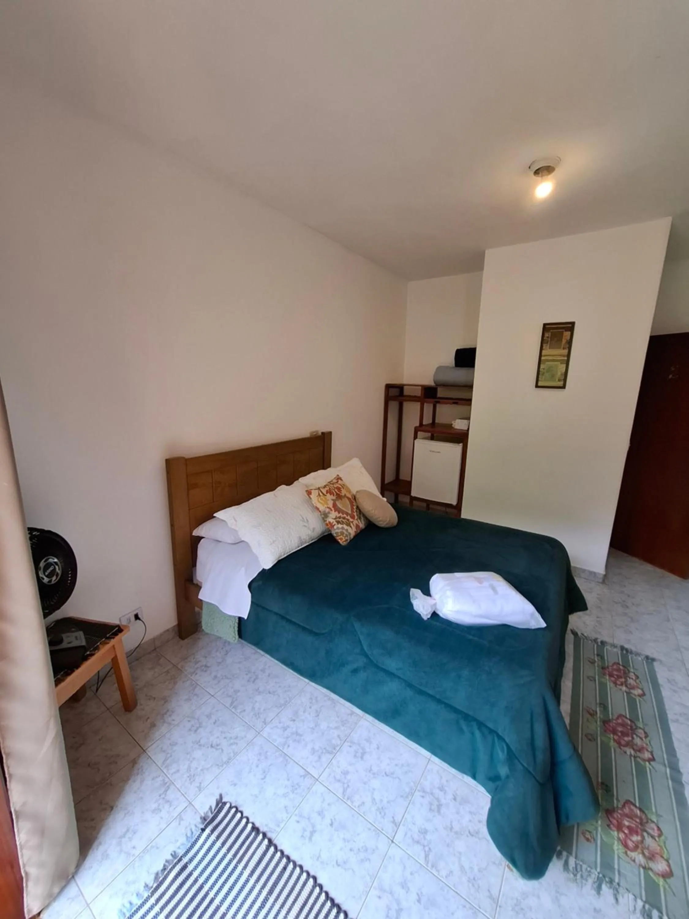 Bed in Pousada Vitória