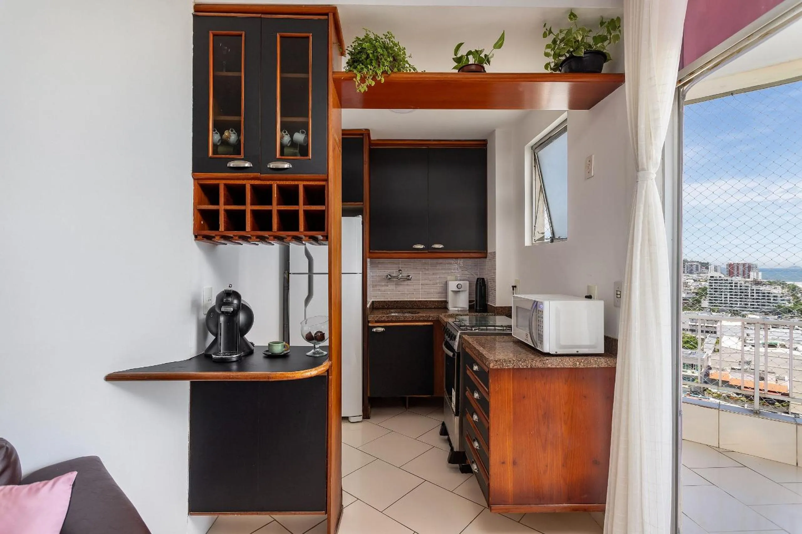 Kitchen or kitchenette in Rental Home Barra Palace Vista para o mar