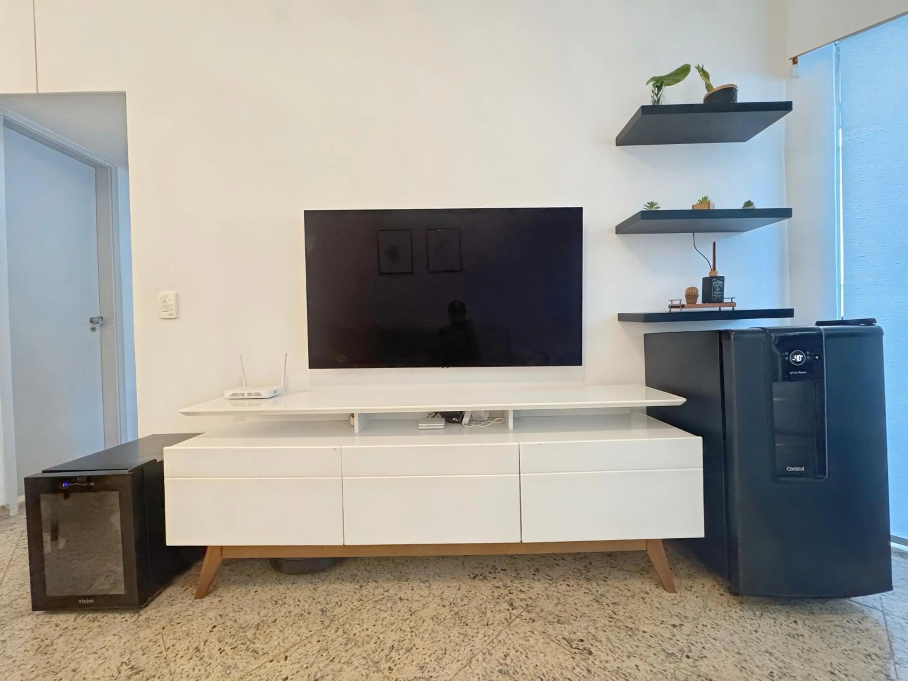 Communal lounge/ TV room in Rental Home Barra Palace Vista para o mar