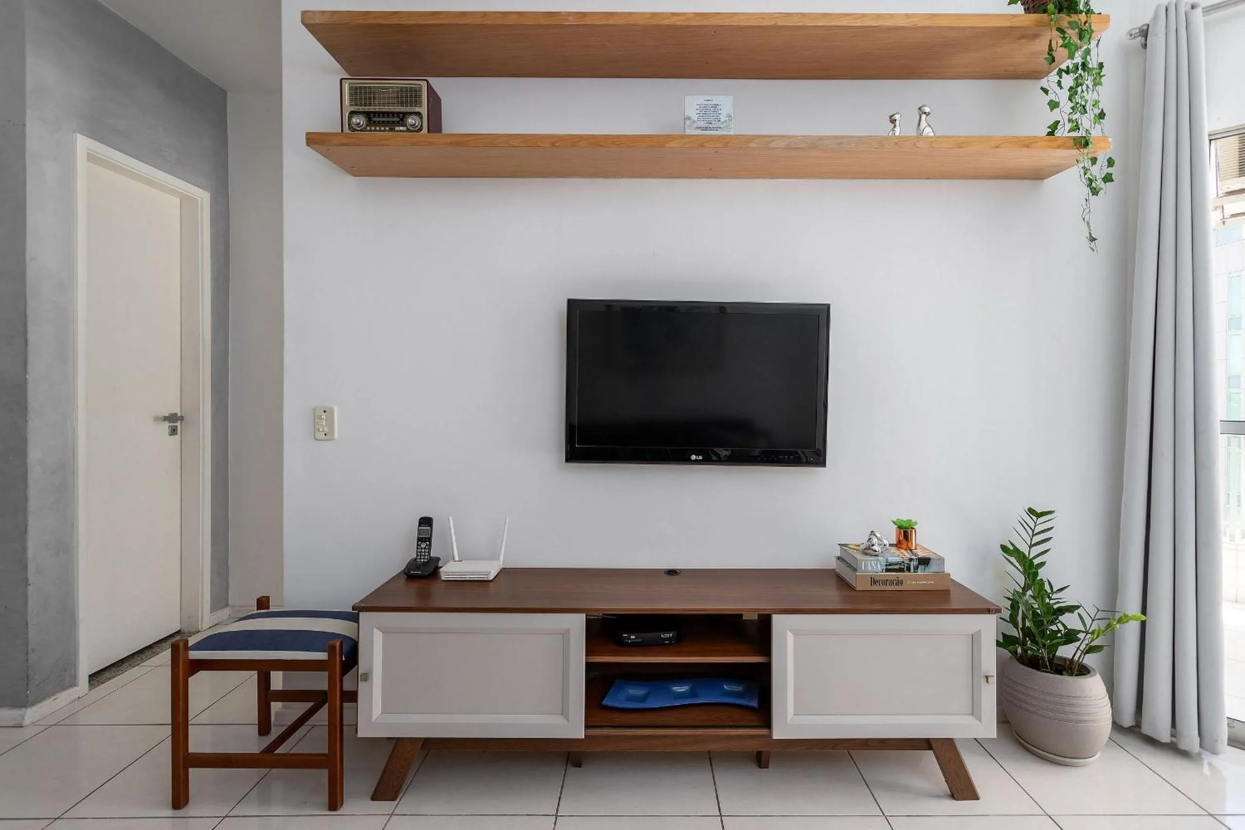 Communal lounge/ TV room in Rental Home Barra Palace Vista para o mar