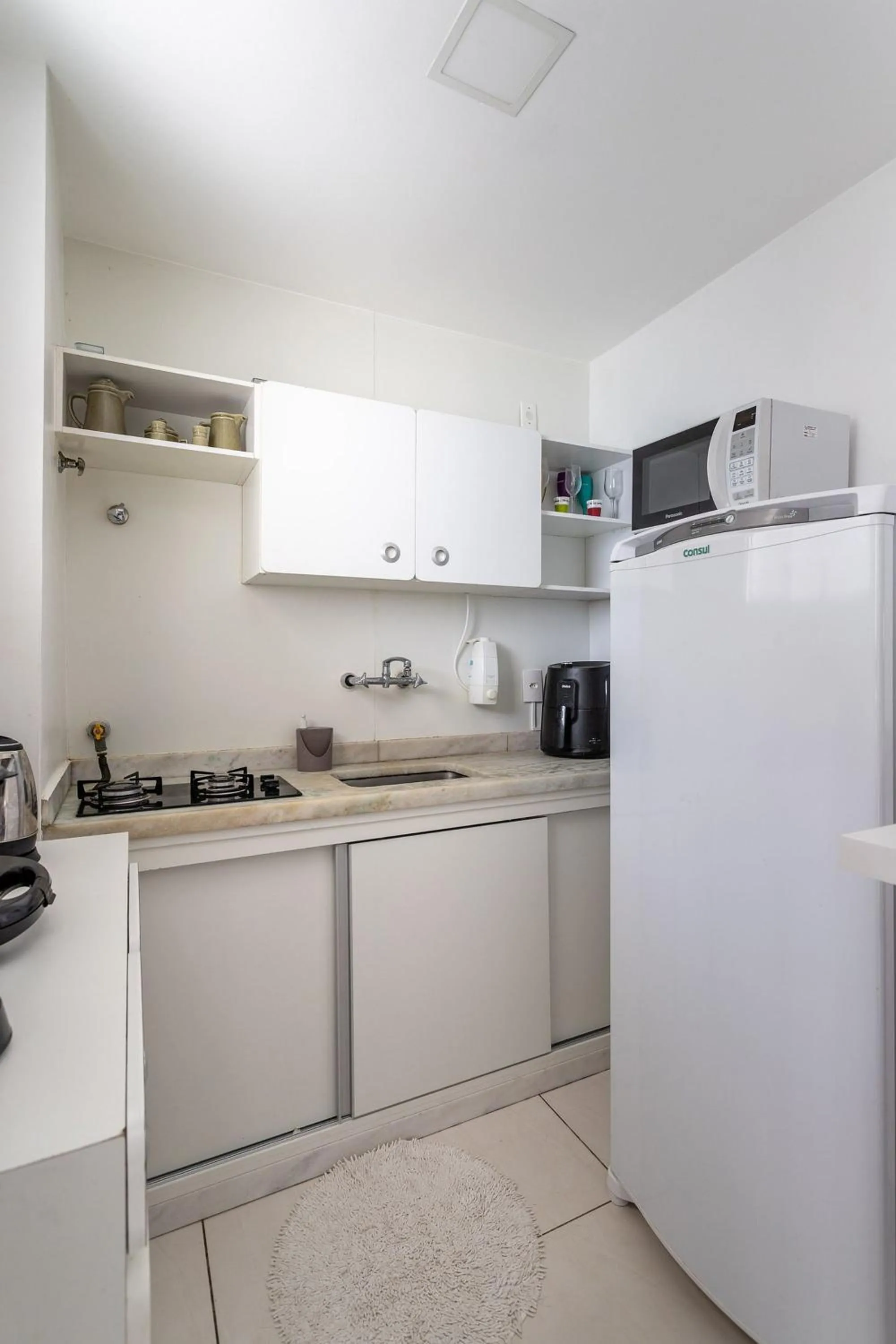 Kitchen or kitchenette in Rental Home Barra Palace Vista para o mar