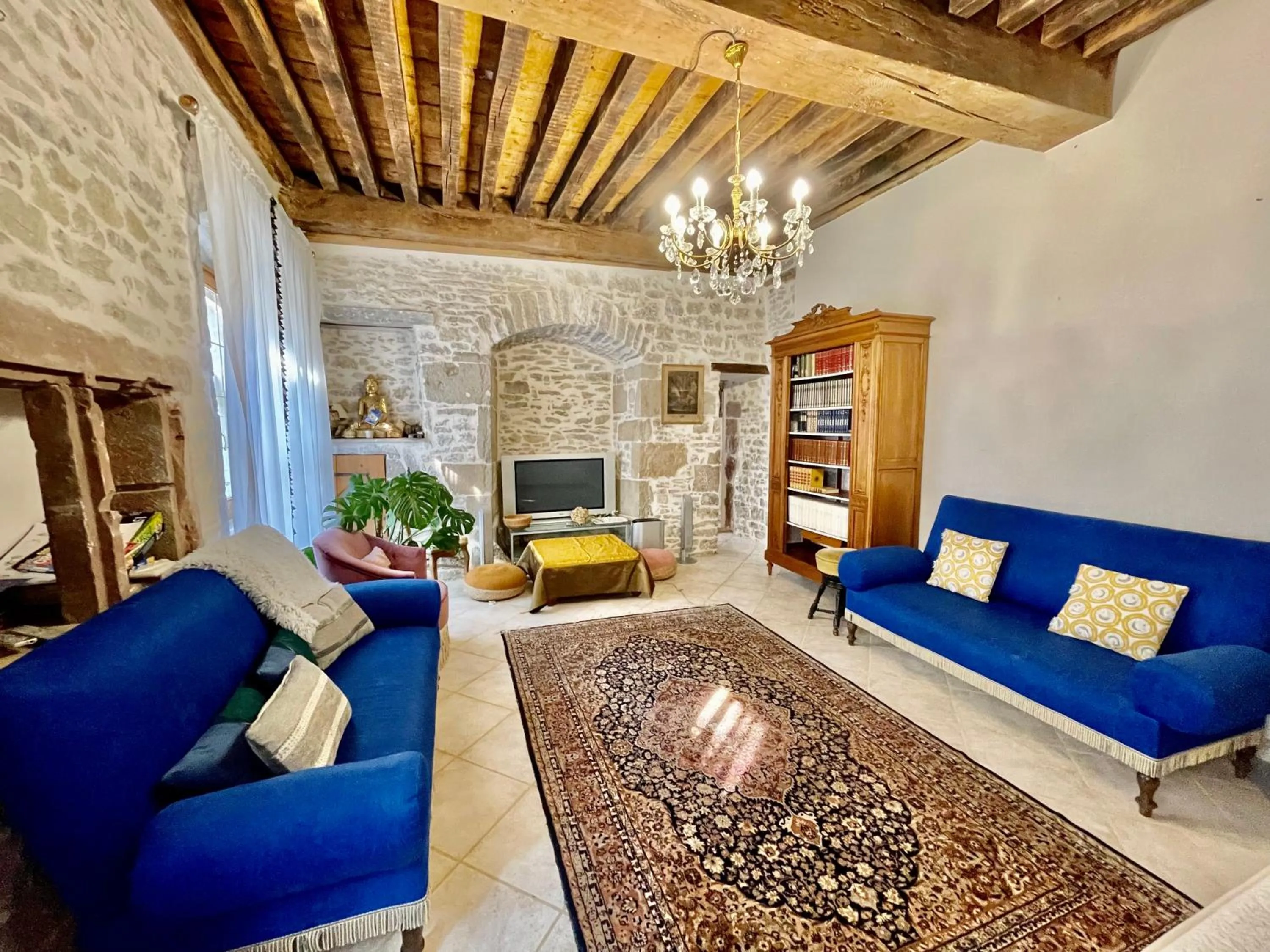 Communal lounge/ TV room in Manoir Saint-Pierre