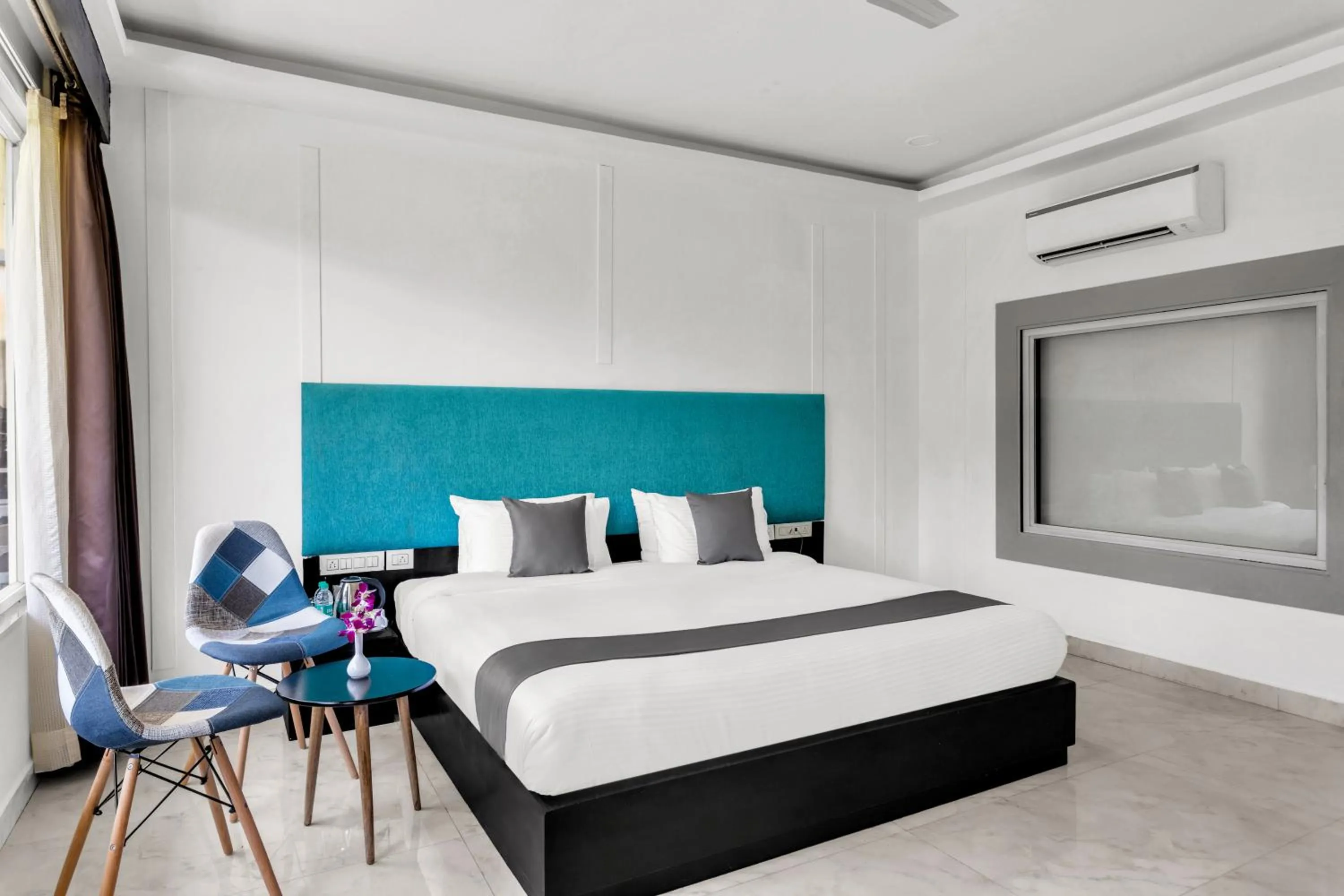 Bed in Koko Maya by Stone Wood Comfort