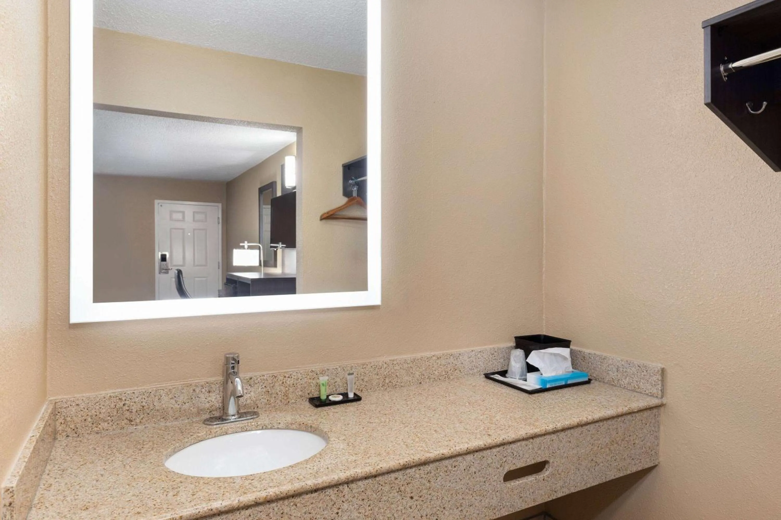 Bathroom in Super 8 by Wyndham Paducah I-24 Exit 4