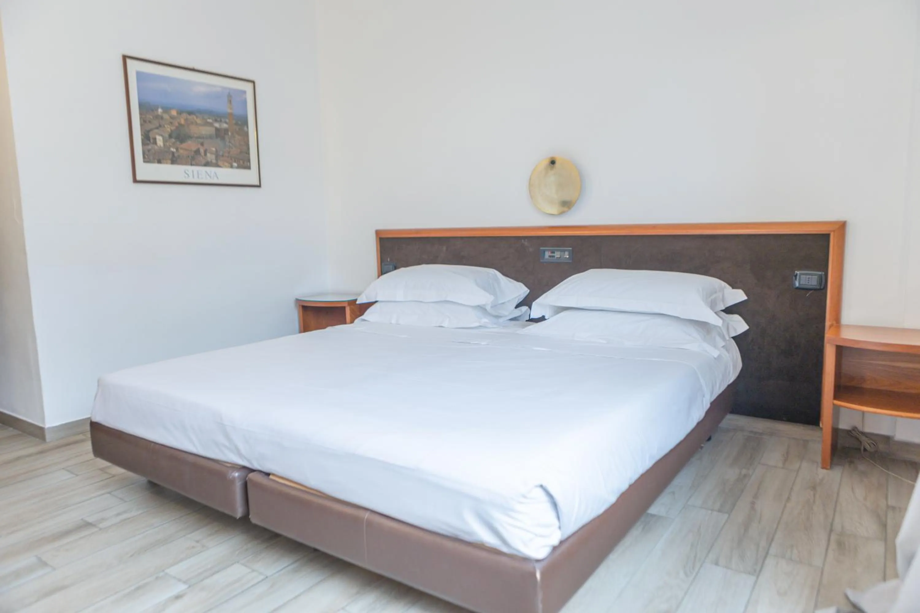 Bed in Toscana Ambassador