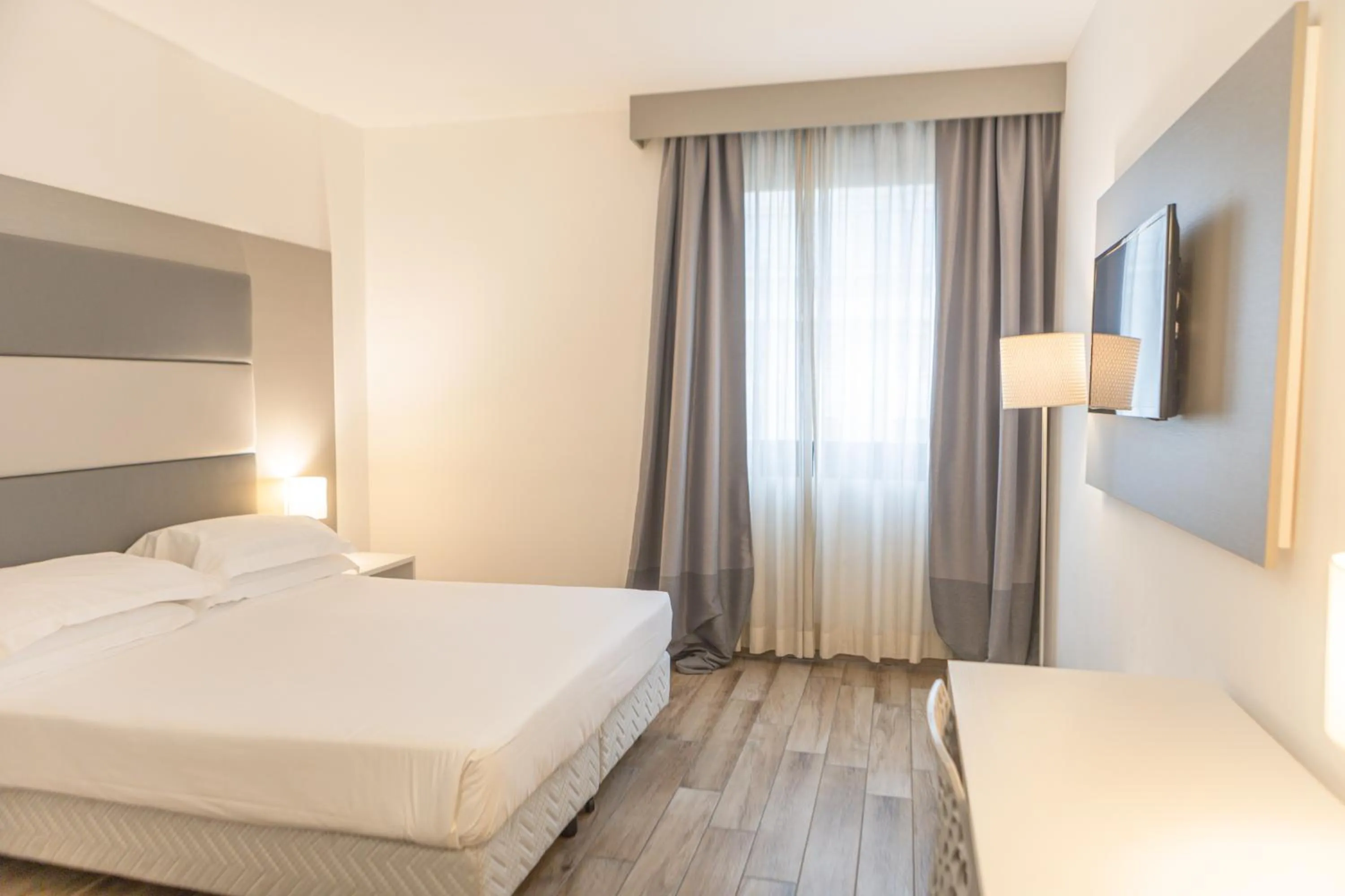 Bed in Toscana Ambassador