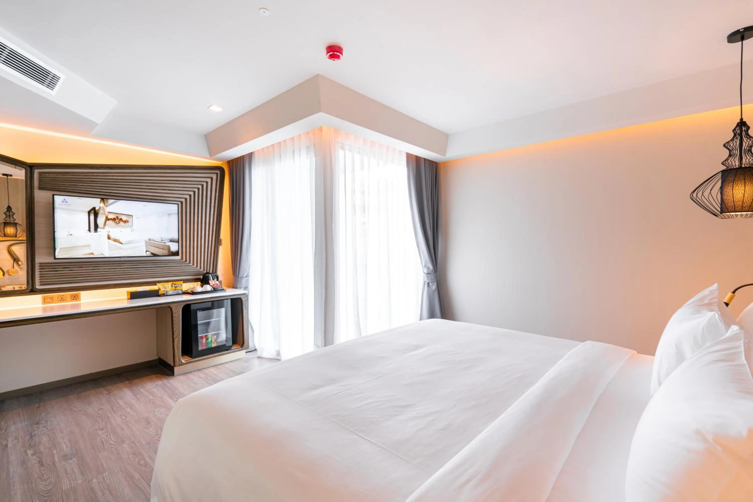 Bed in Amethyst Hotel Pattaya