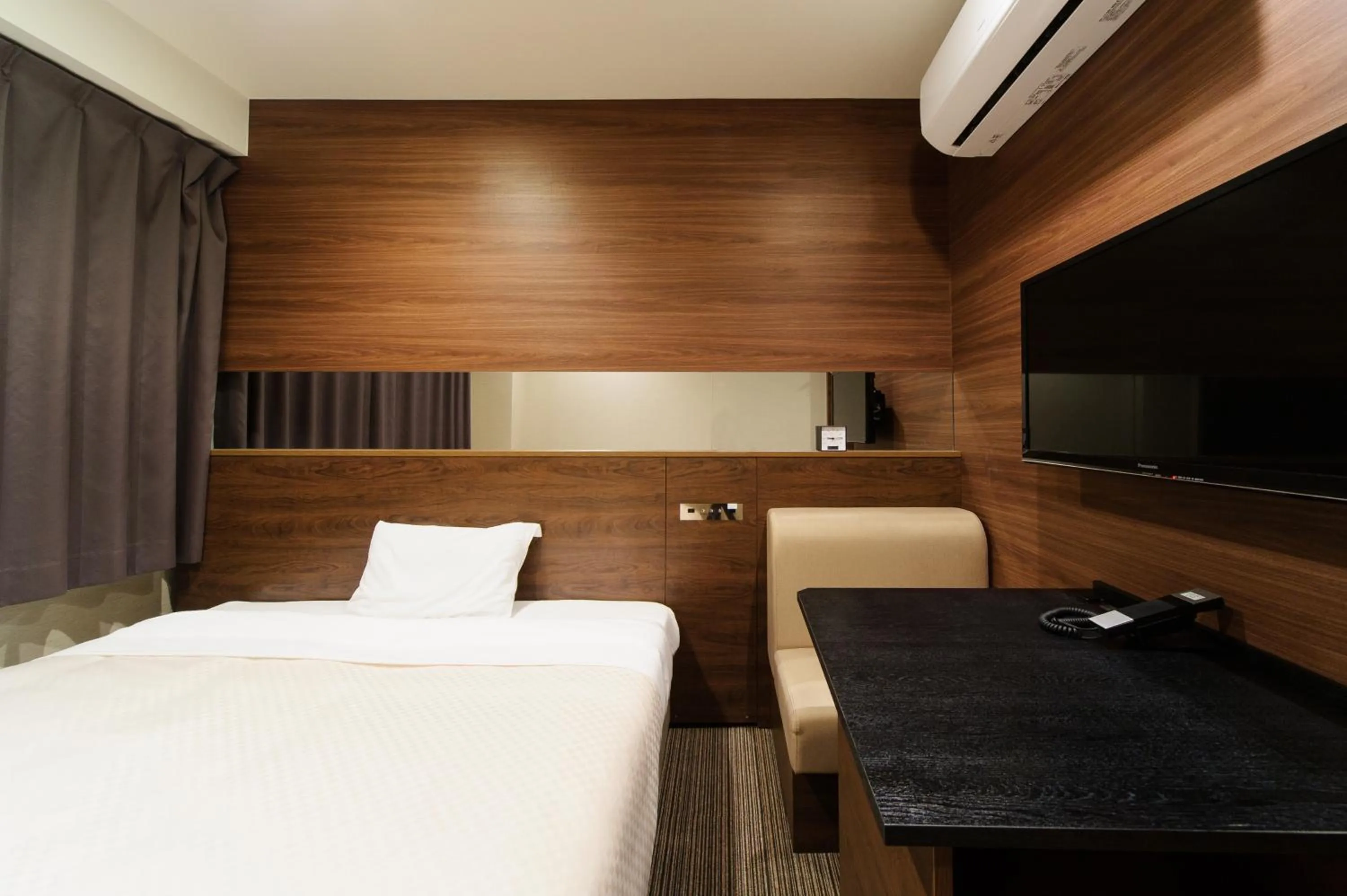 Bed in Osaka Fujiya Hotel