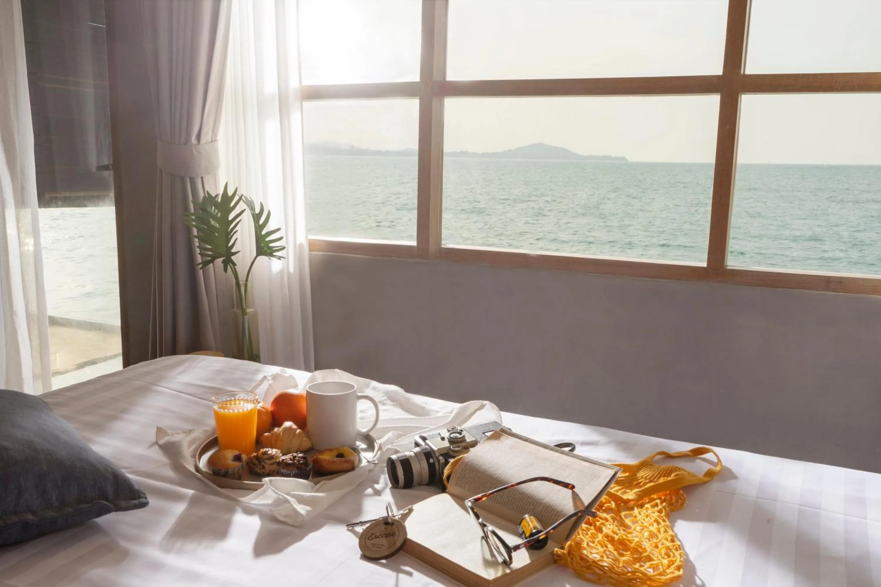 Sea view, Bed in Escape Beach Resort - New Look & Improved