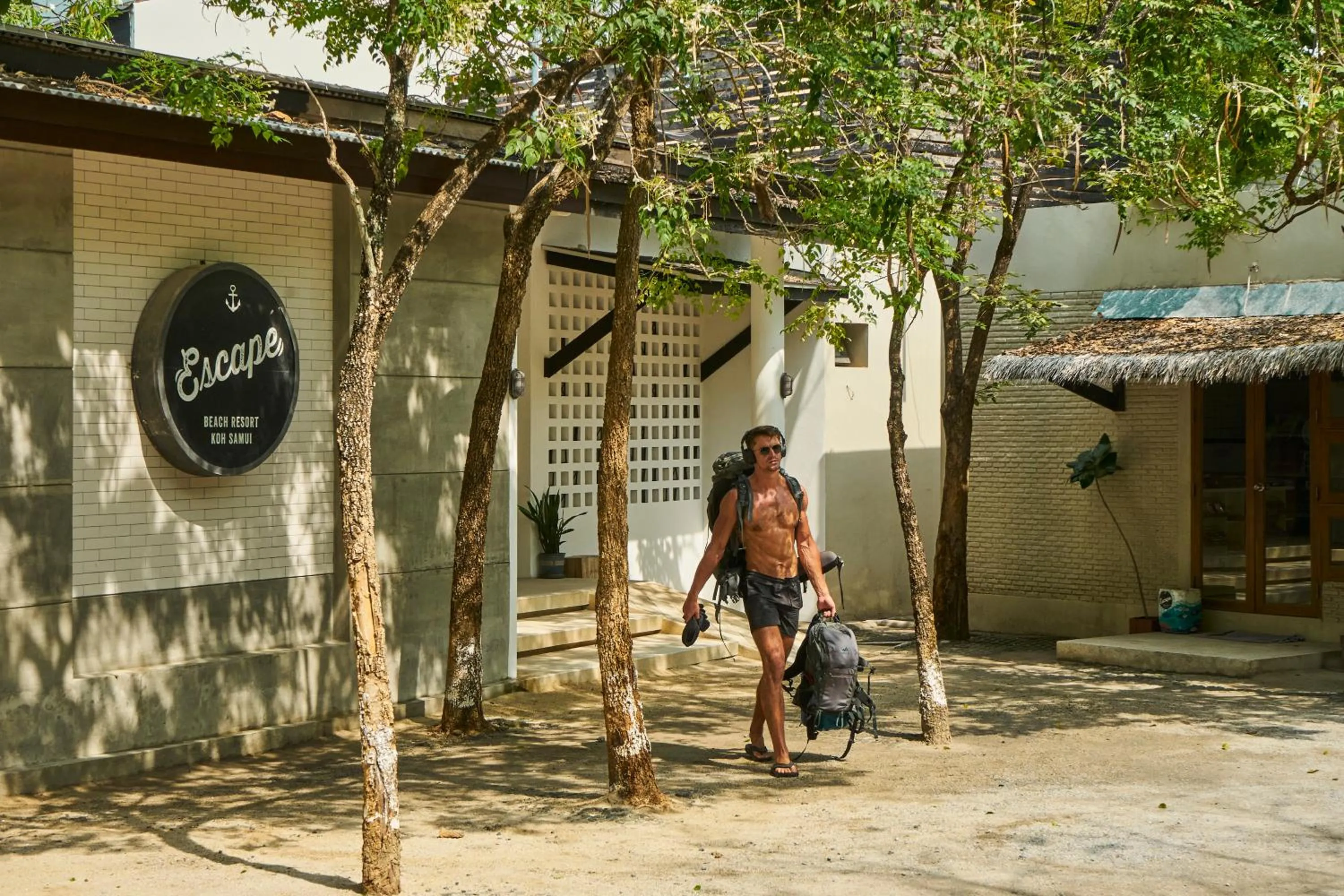 Property logo or sign in Escape Beach Resort - New Look & Improved