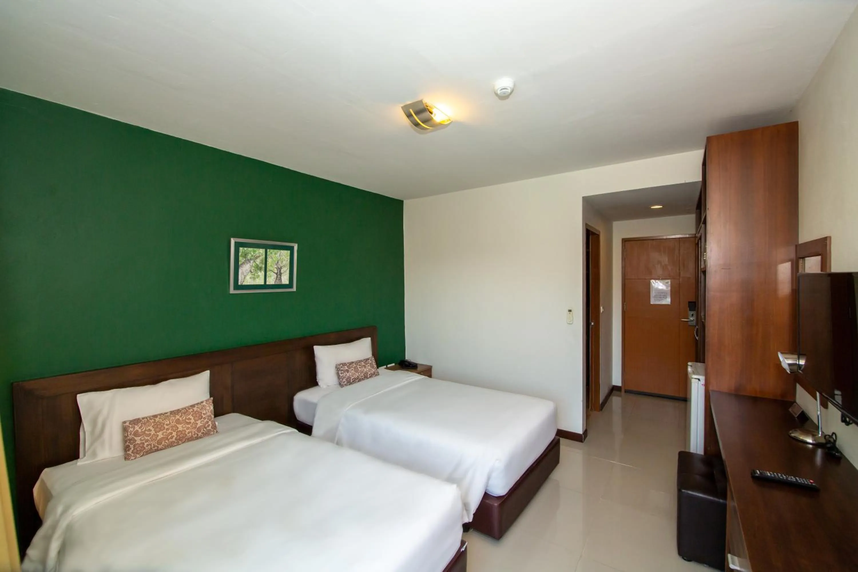 Bed in WE Valley Hotel