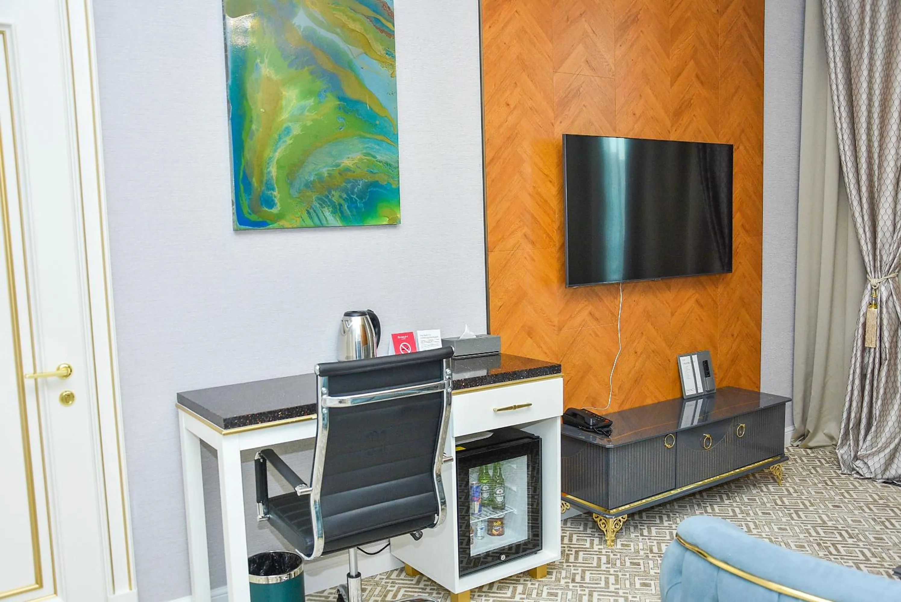 Communal lounge/ TV room in Ramada by Wyndham Turkistan