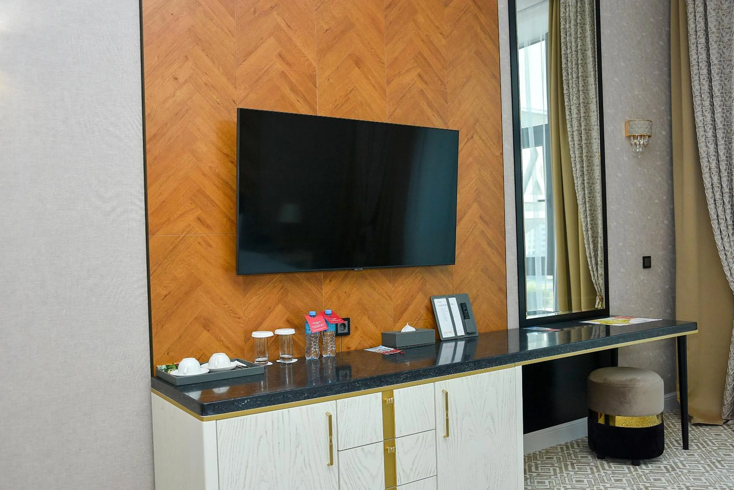 TV and multimedia in Ramada by Wyndham Turkistan
