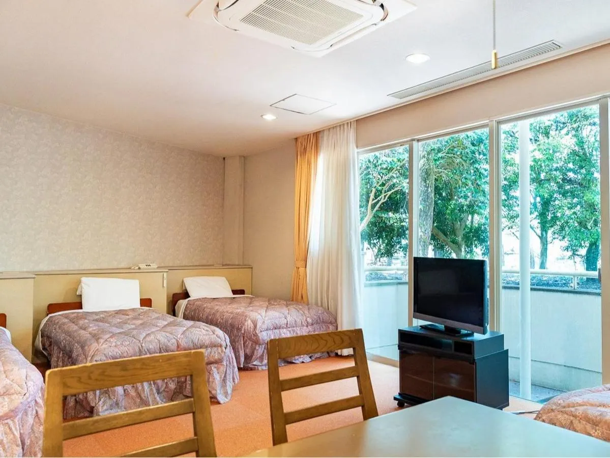 Photo of the whole room, Bed in Seagaia Forest Cottages