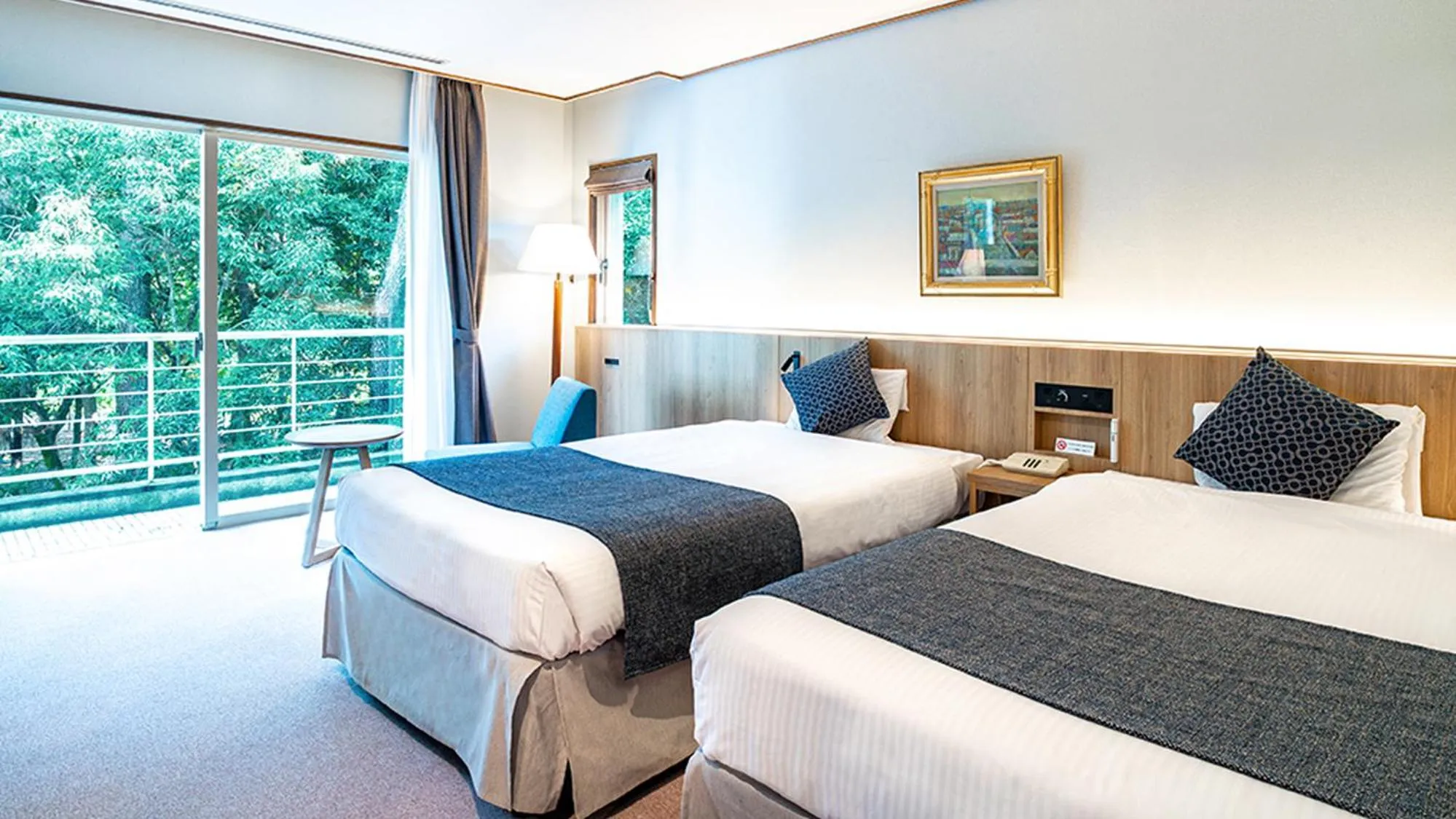 Bed in Seagaia Forest Cottages