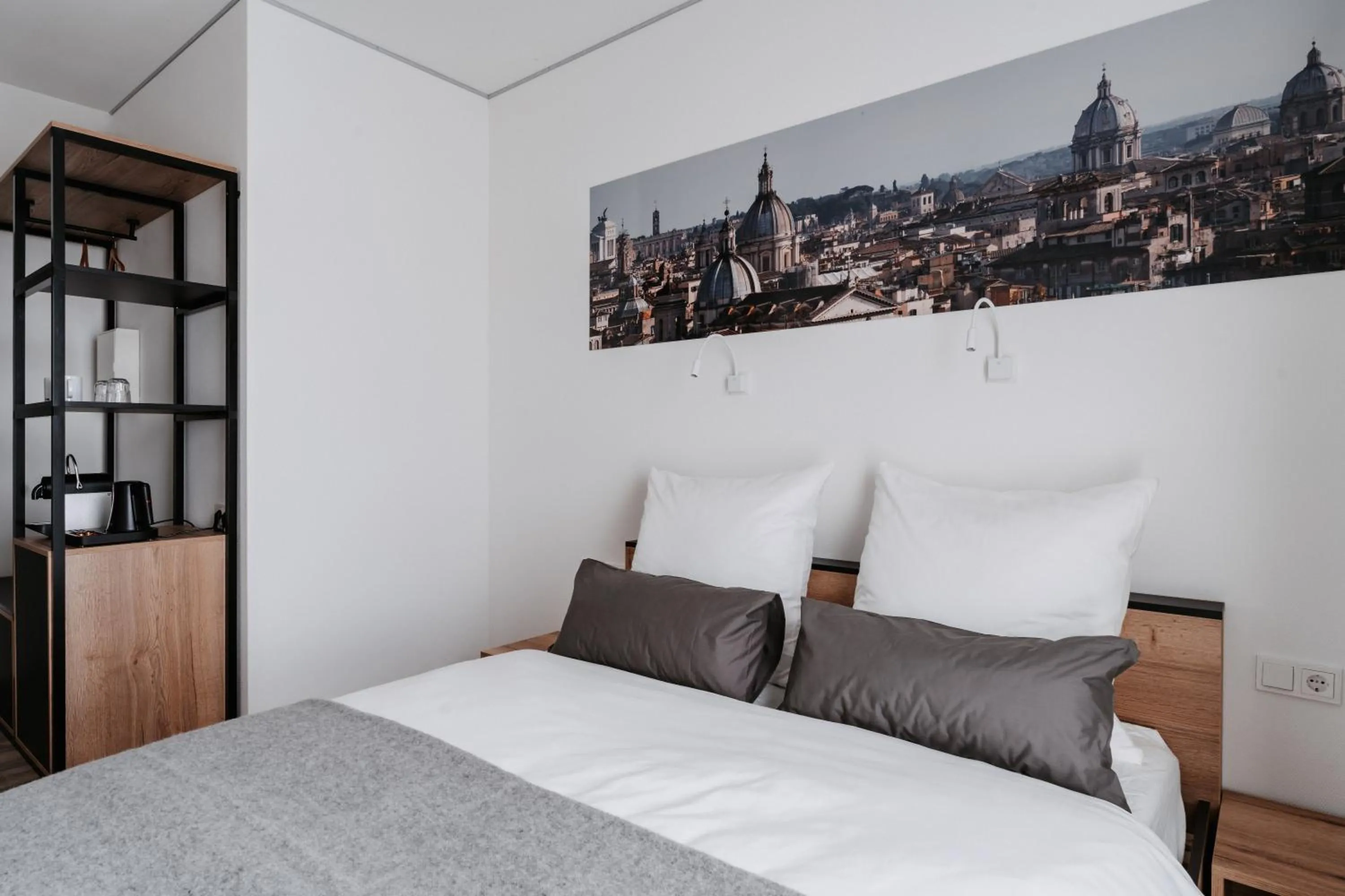 Bed in STEP INN The Fair Hotel