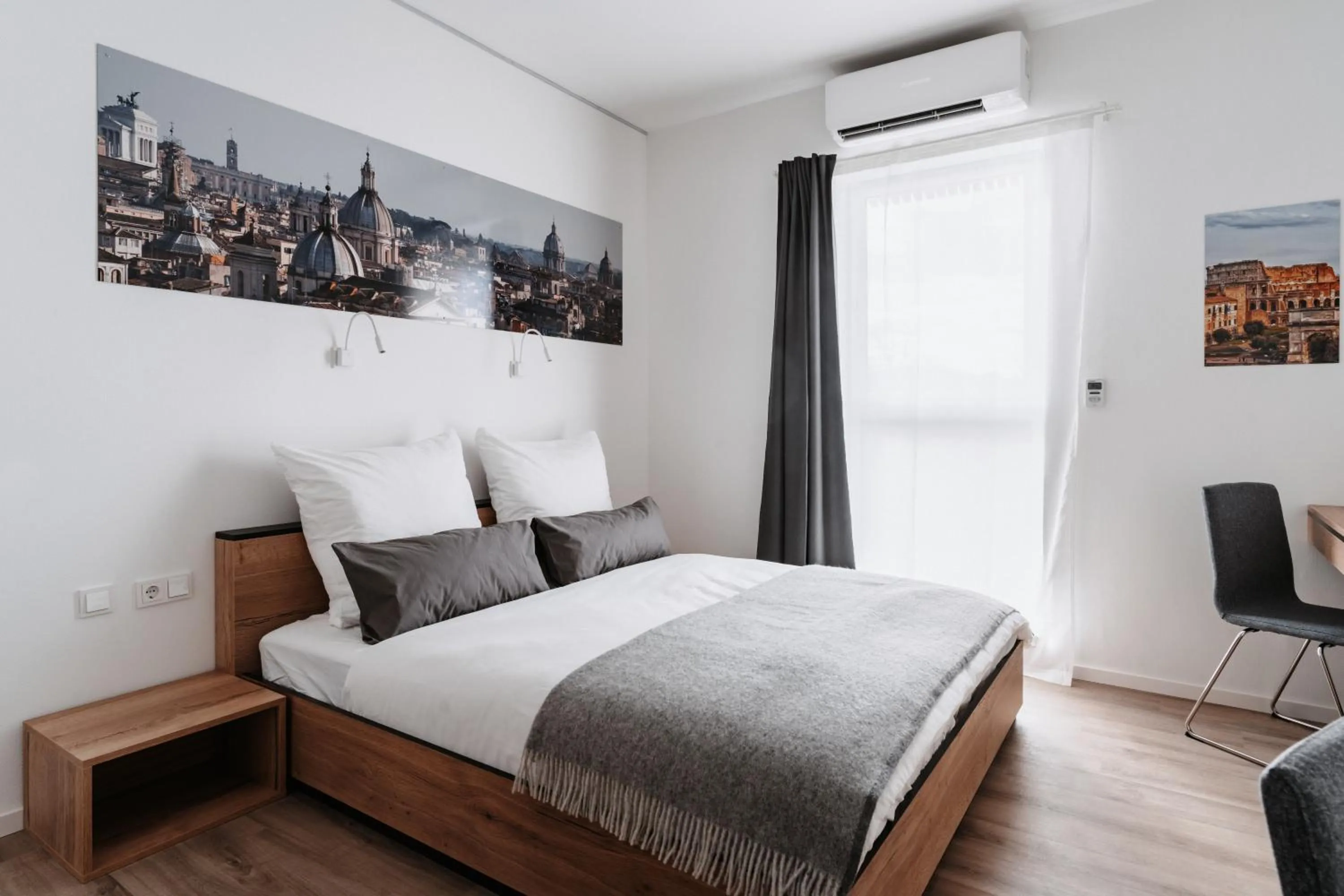 Bed in STEP INN The Fair Hotel