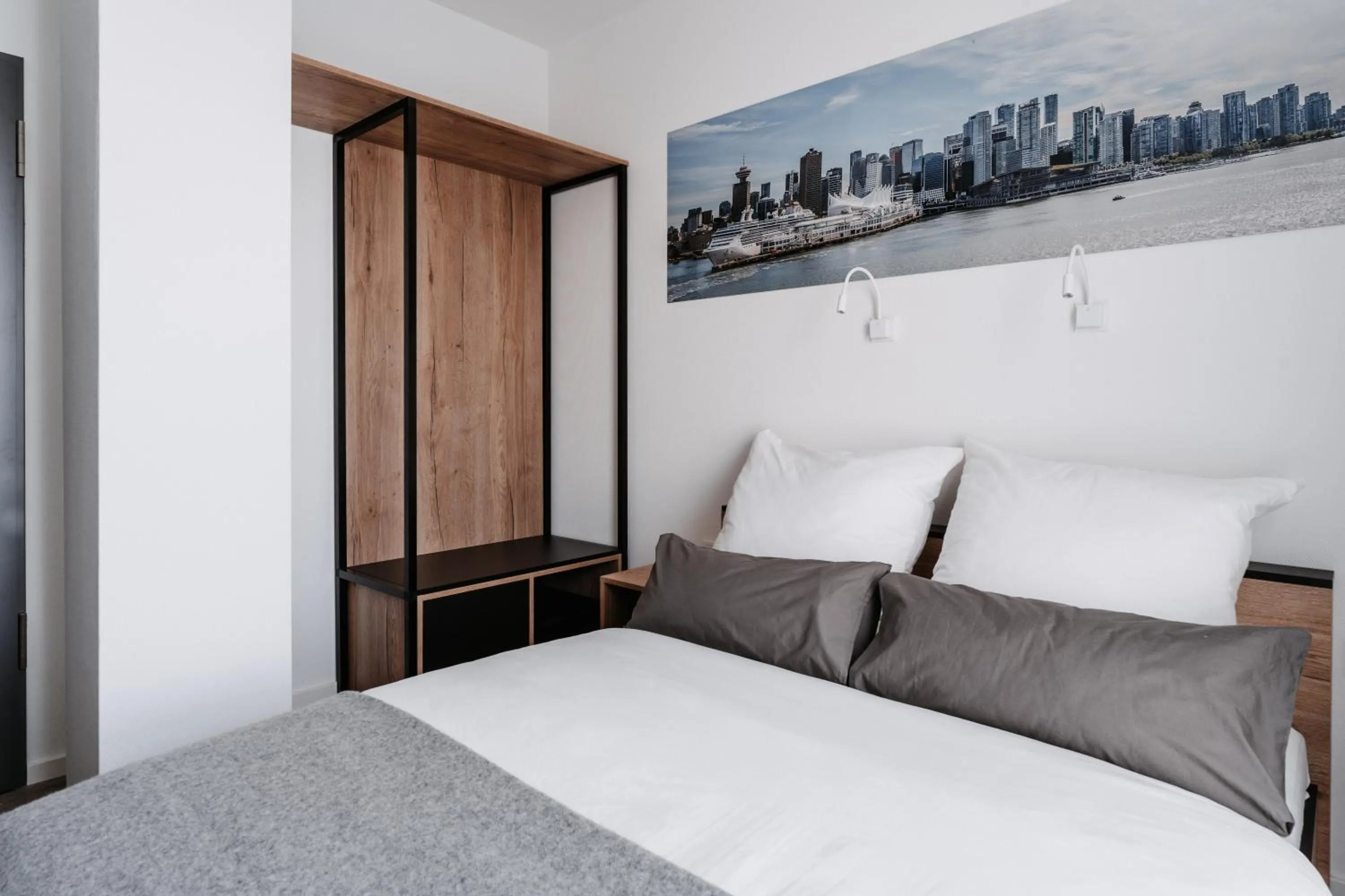 Bed in STEP INN The Fair Hotel