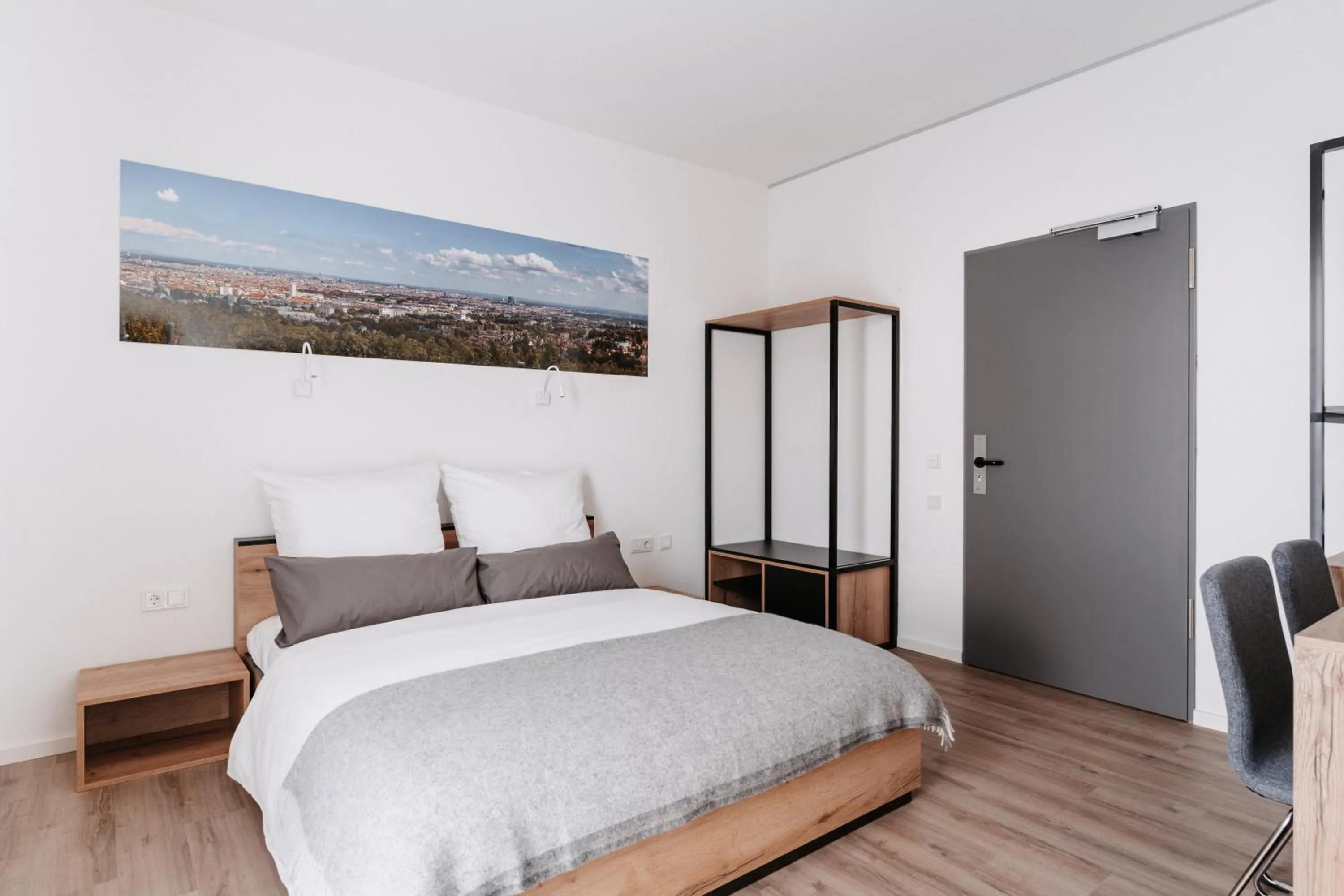 Bed in STEP INN The Fair Hotel