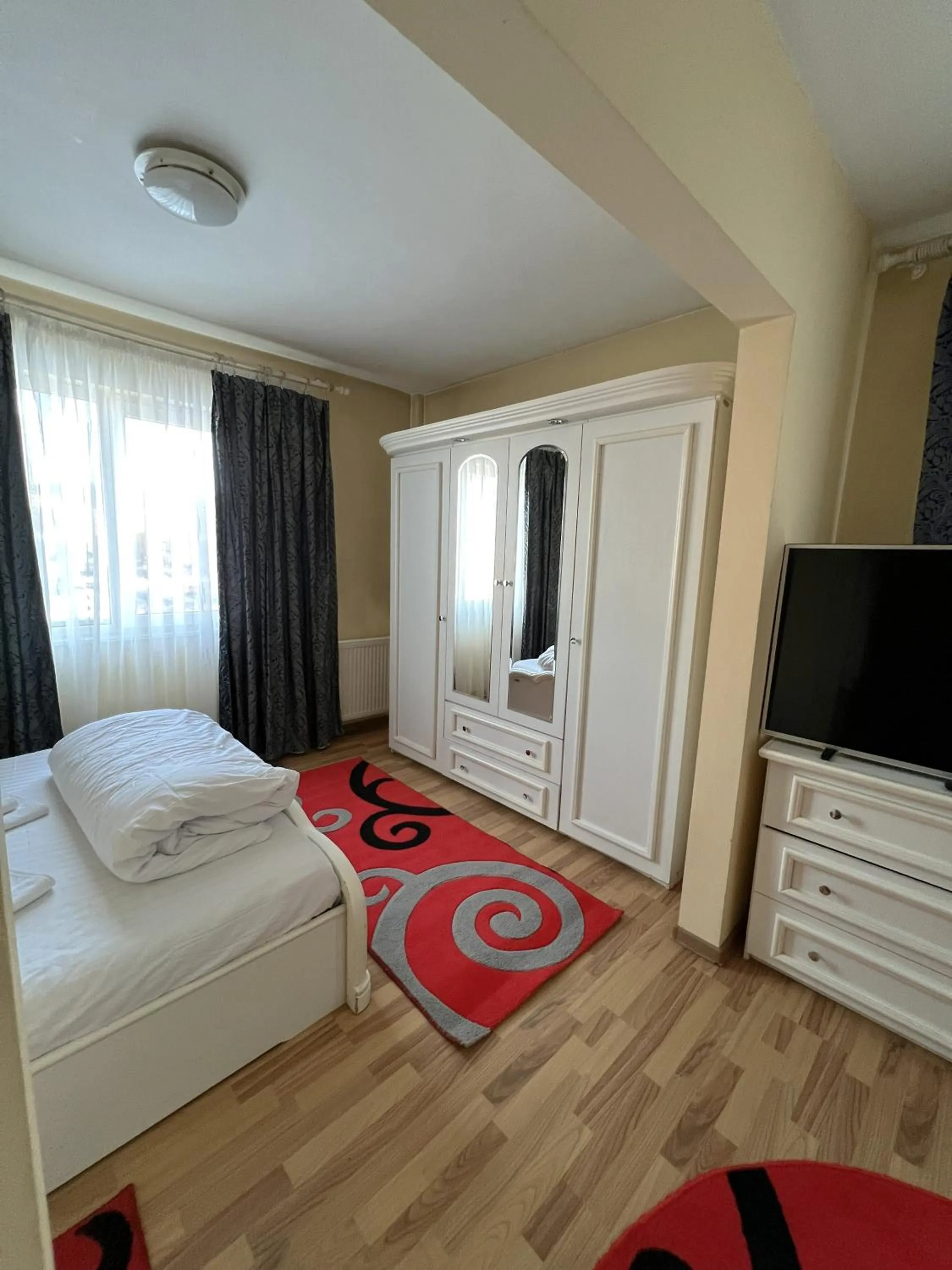 Bed in Hotel Decebal Bistrita