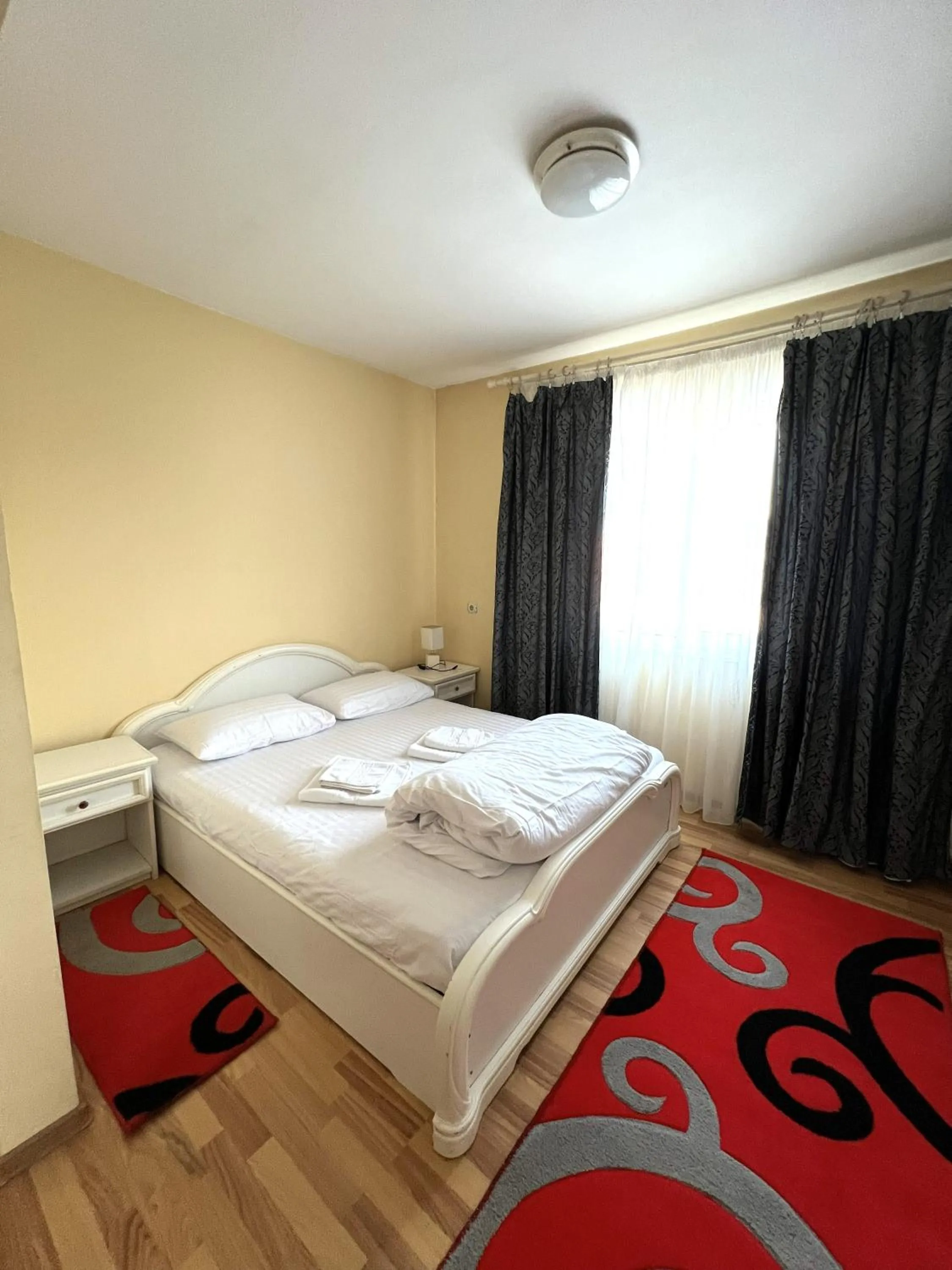 Bed in Hotel Decebal Bistrita