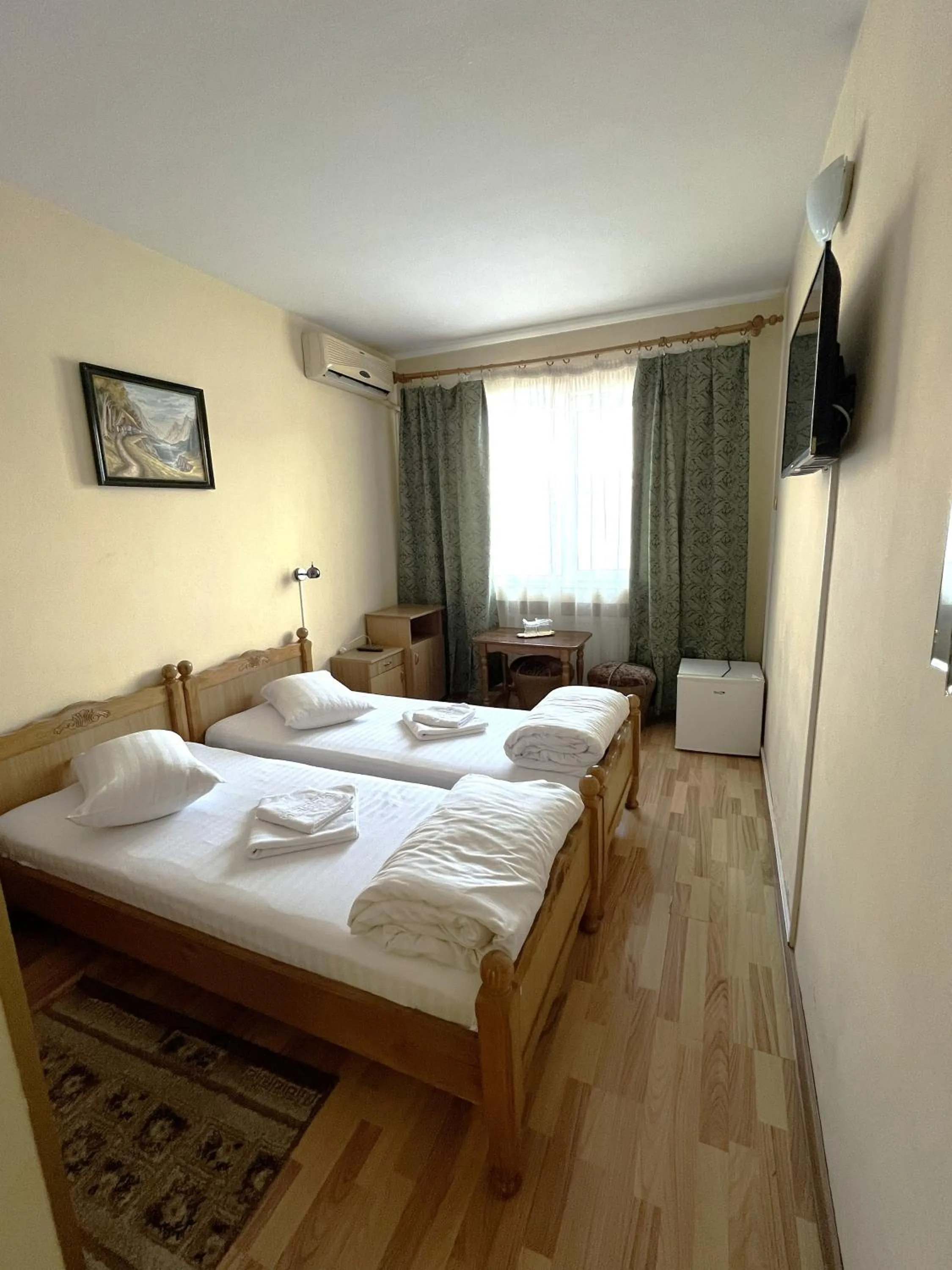 Bed in Hotel Decebal Bistrita