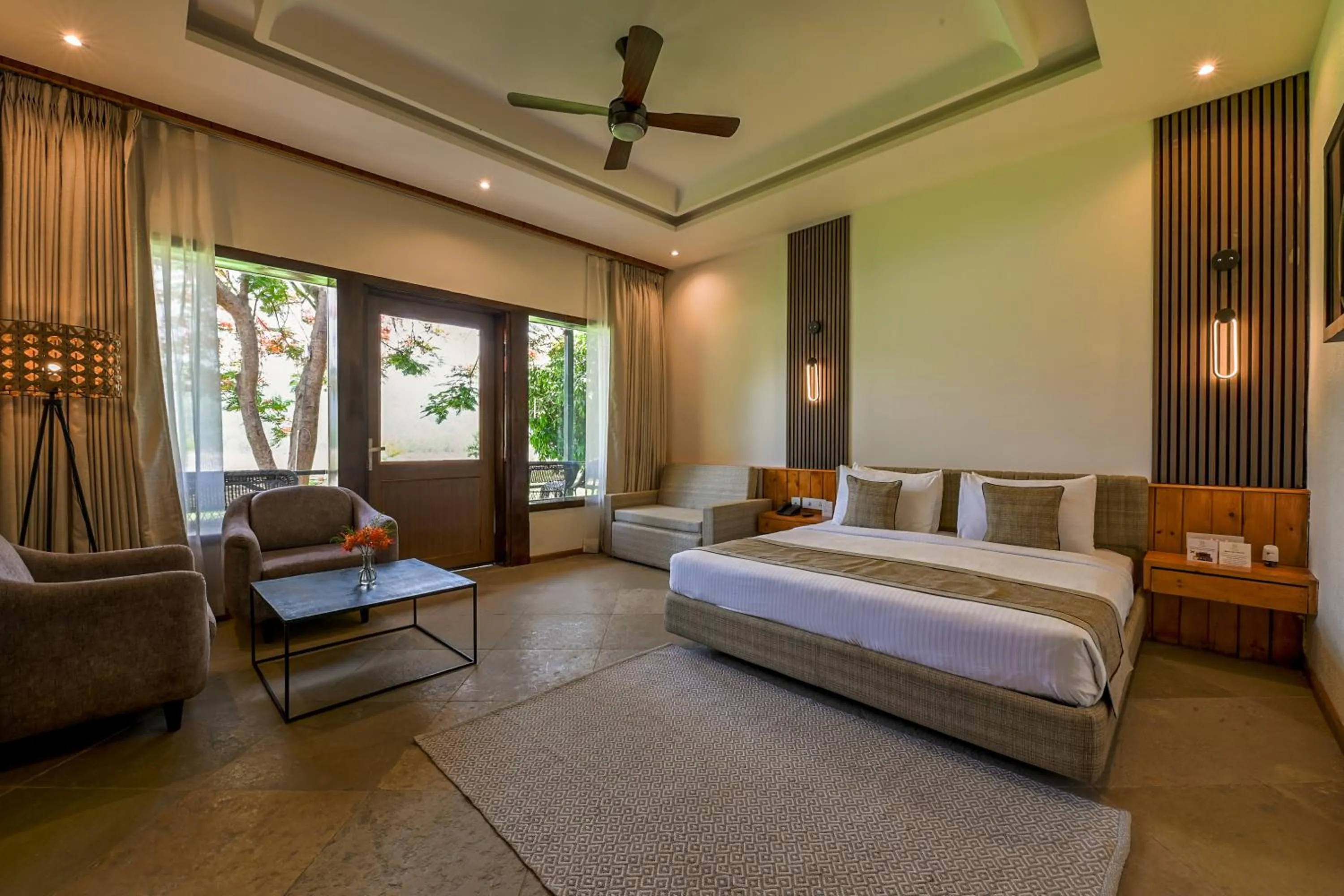 Photo of the whole room, Bed in Tarangi Resort and Spa