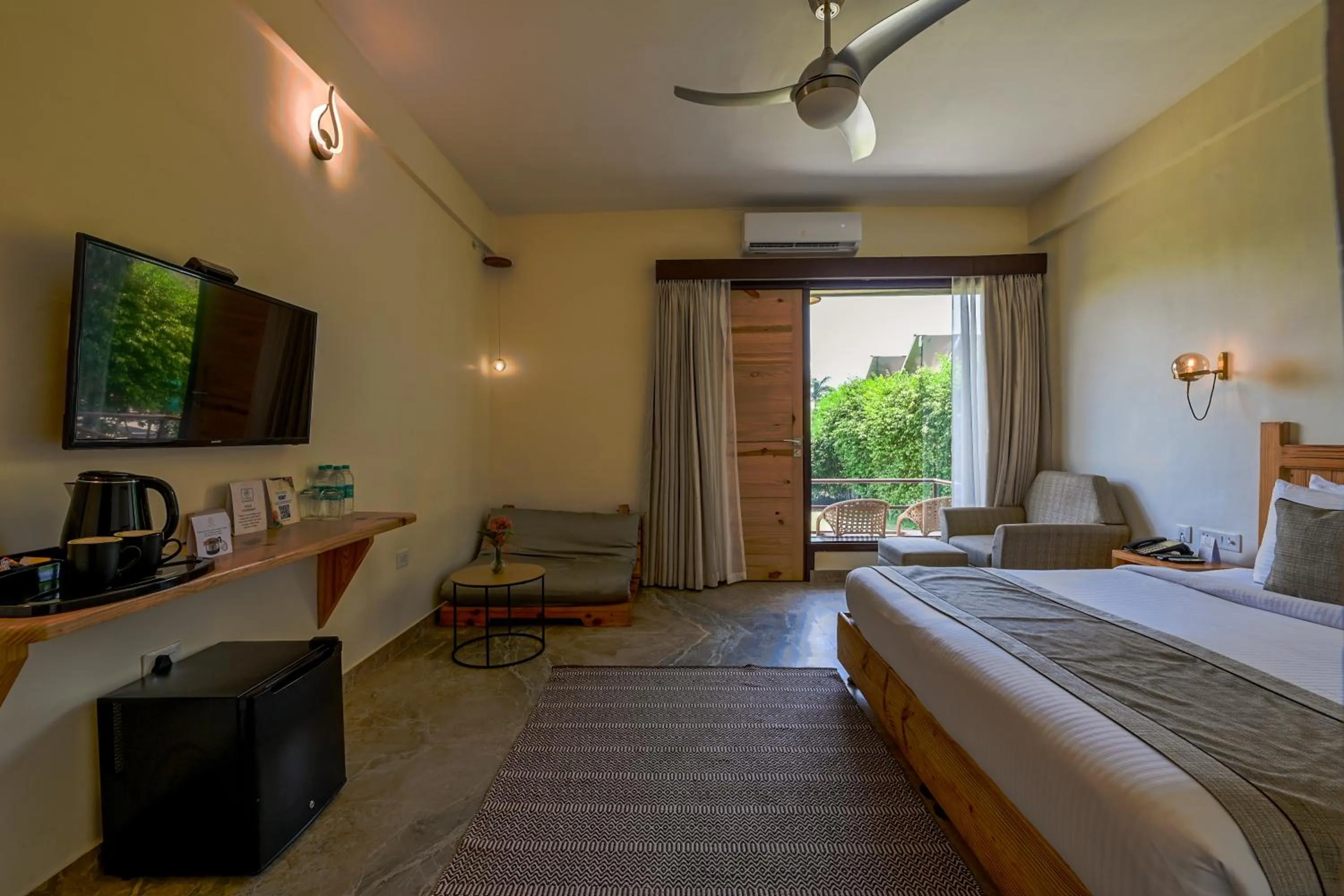 Photo of the whole room, Bed in Tarangi Resort and Spa