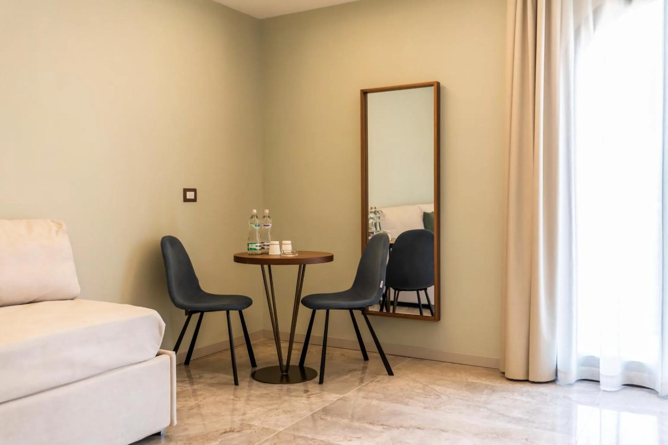 Living room in SOLMARIS TROPEA City Center - Rooms & Suites - Private Parking